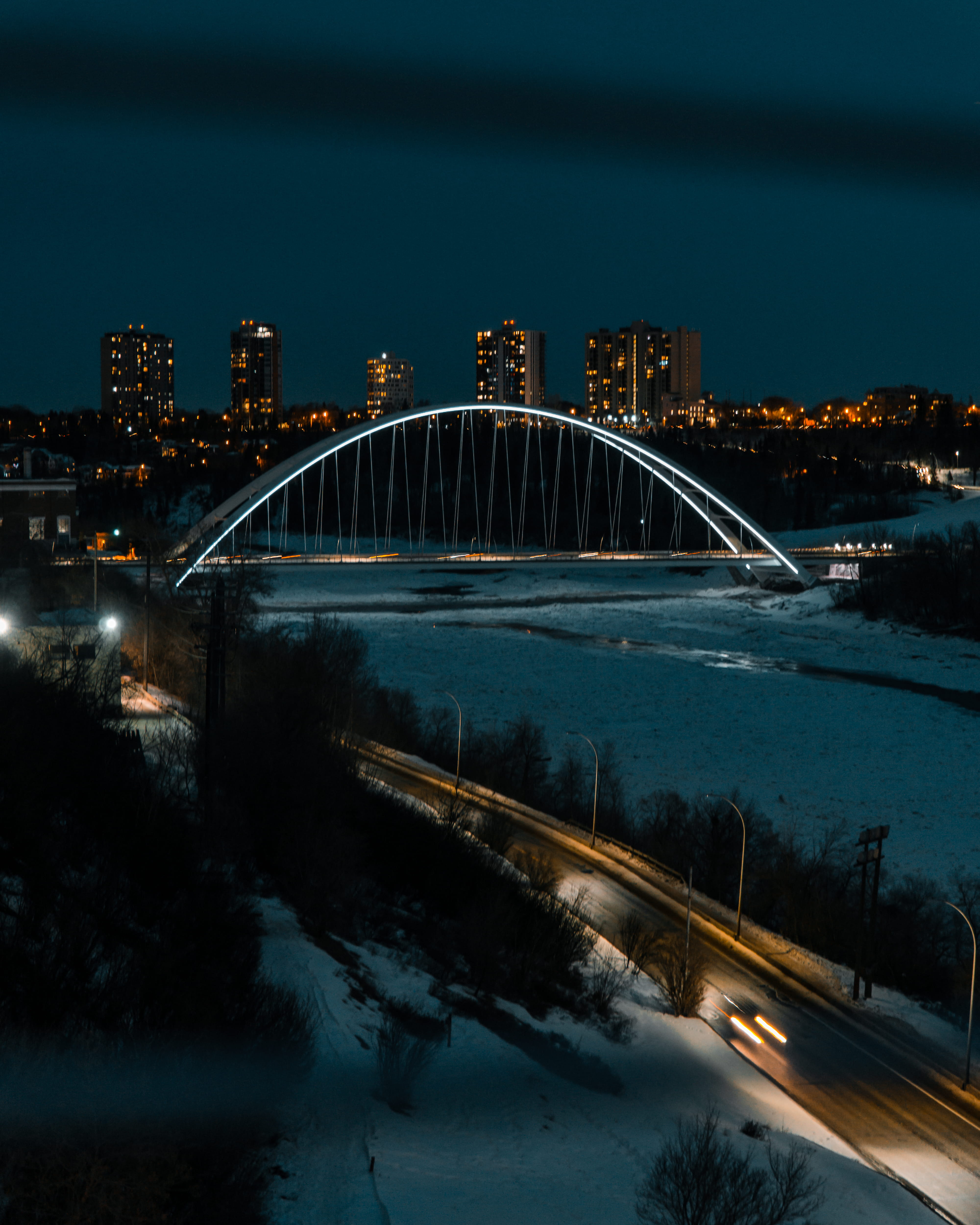 outdoors, sky, 4K, water, arch bridge, road, built structure, connection, town, transportation, metal, light trail, metropolis, light, night, nightscape, Phone HD Wallpaper
