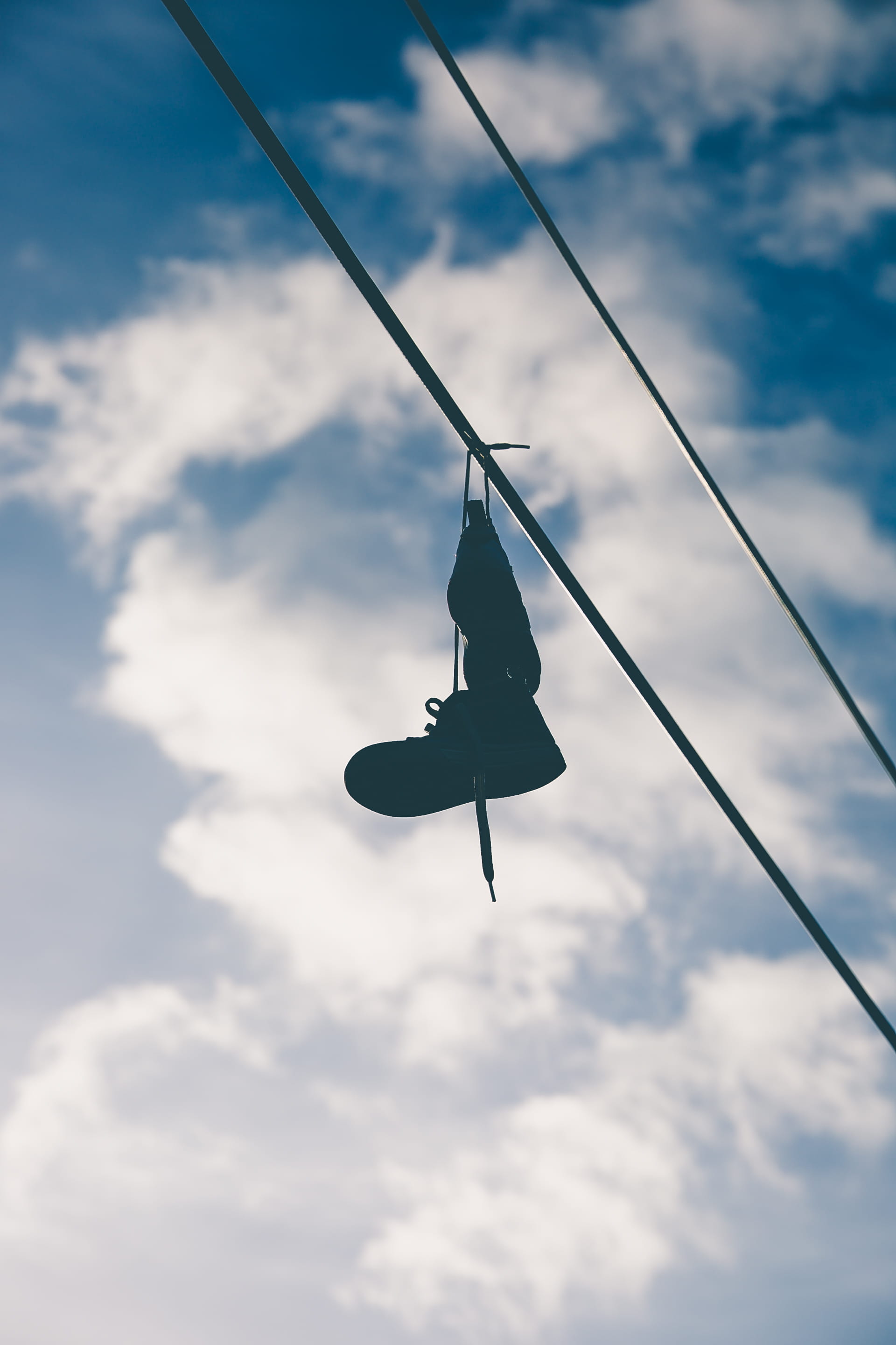hanging, nature, low angle view, cable, hanging shoe, 2K, fun, telephone wire, arts culture and entertainment, outdoors, swing, extreme sports, sky, enjoyment, Phone HD Wallpaper