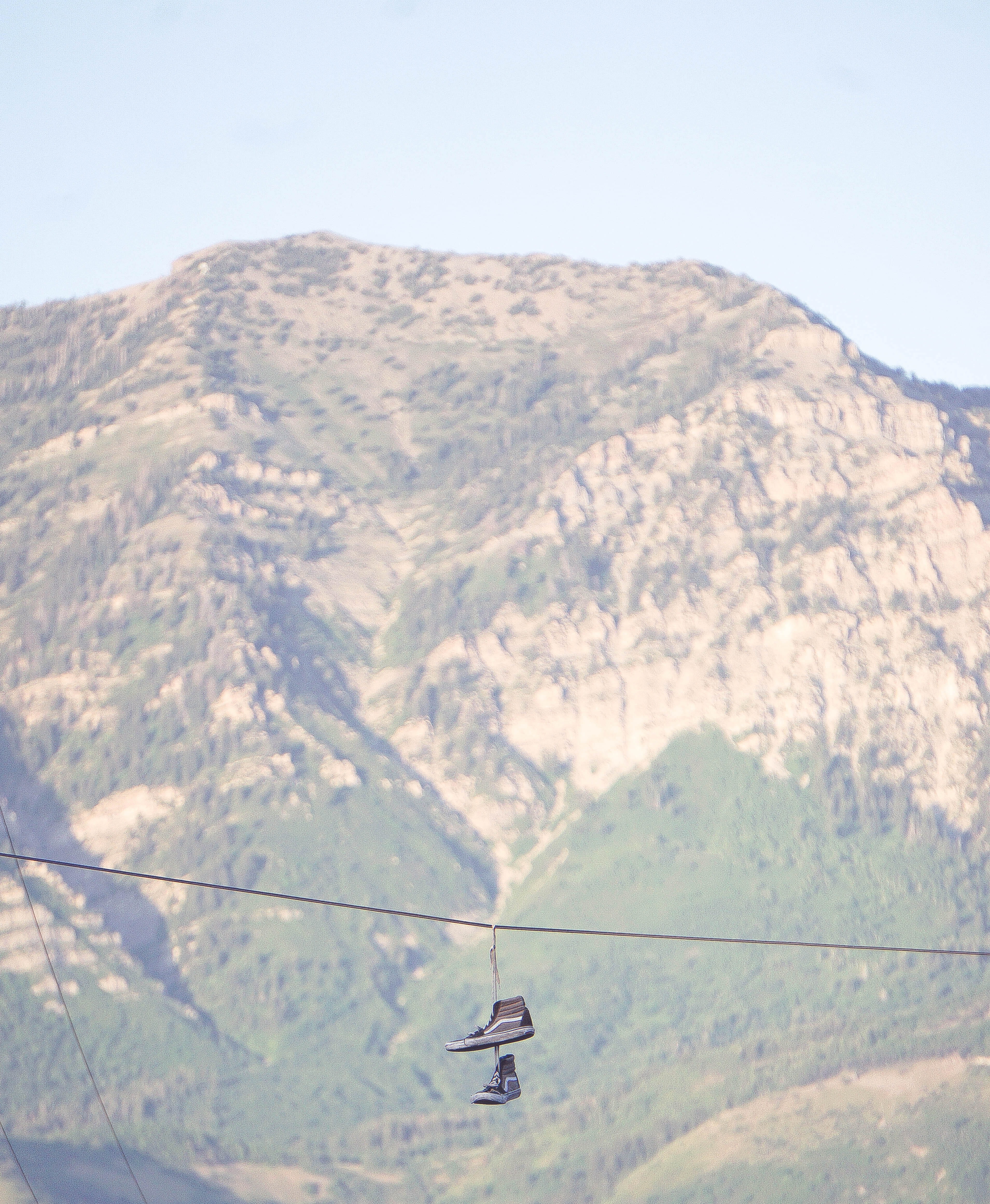 transportation, aerial view, crest, cable, landscape, closeup, shoes on wire, nature, sky, rope, environment, shoes hanging, utah, 4K, brown, glacier, Phone HD Wallpaper