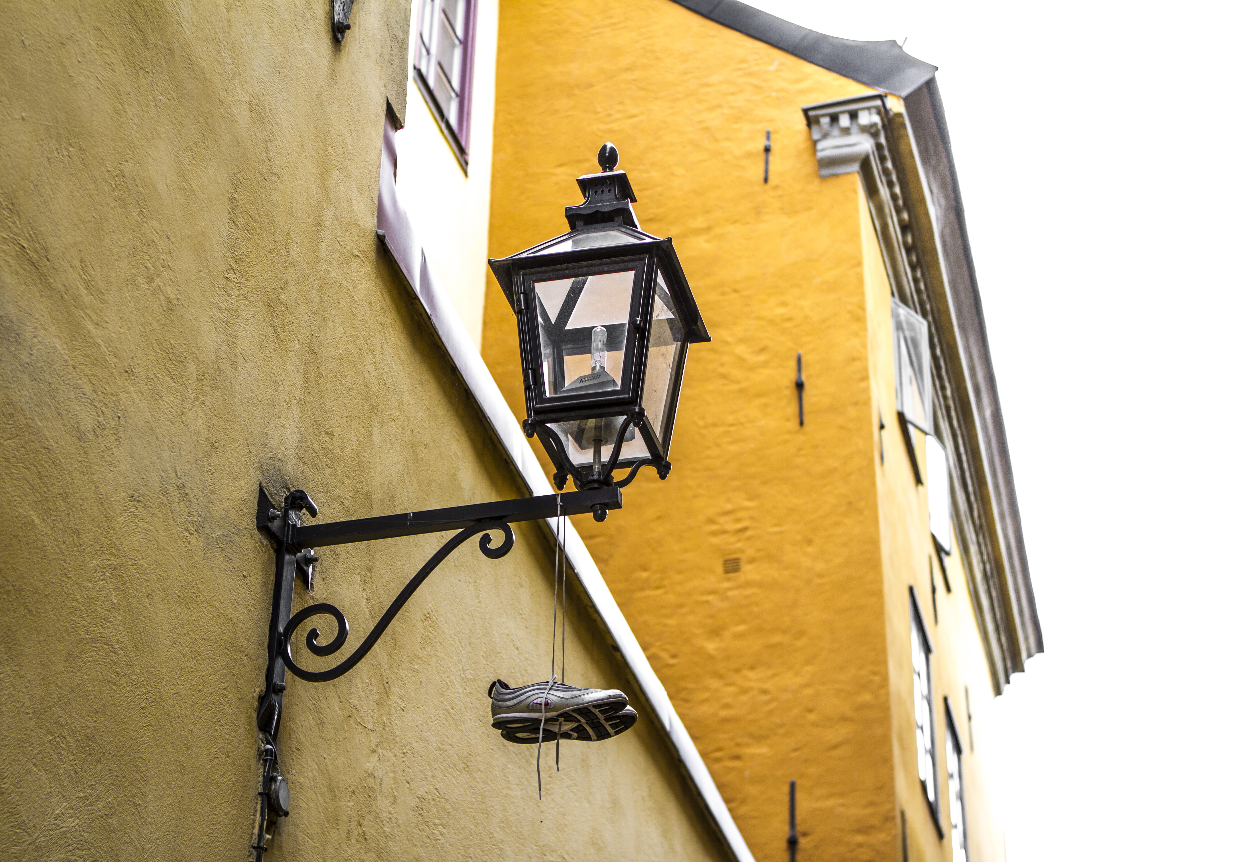 old city, outdoors, street light, sketchers, europe, building exterior, wall, window, shoes on a wire, street, low angle view, sneakers, stockholm, no people, HD Wallpaper