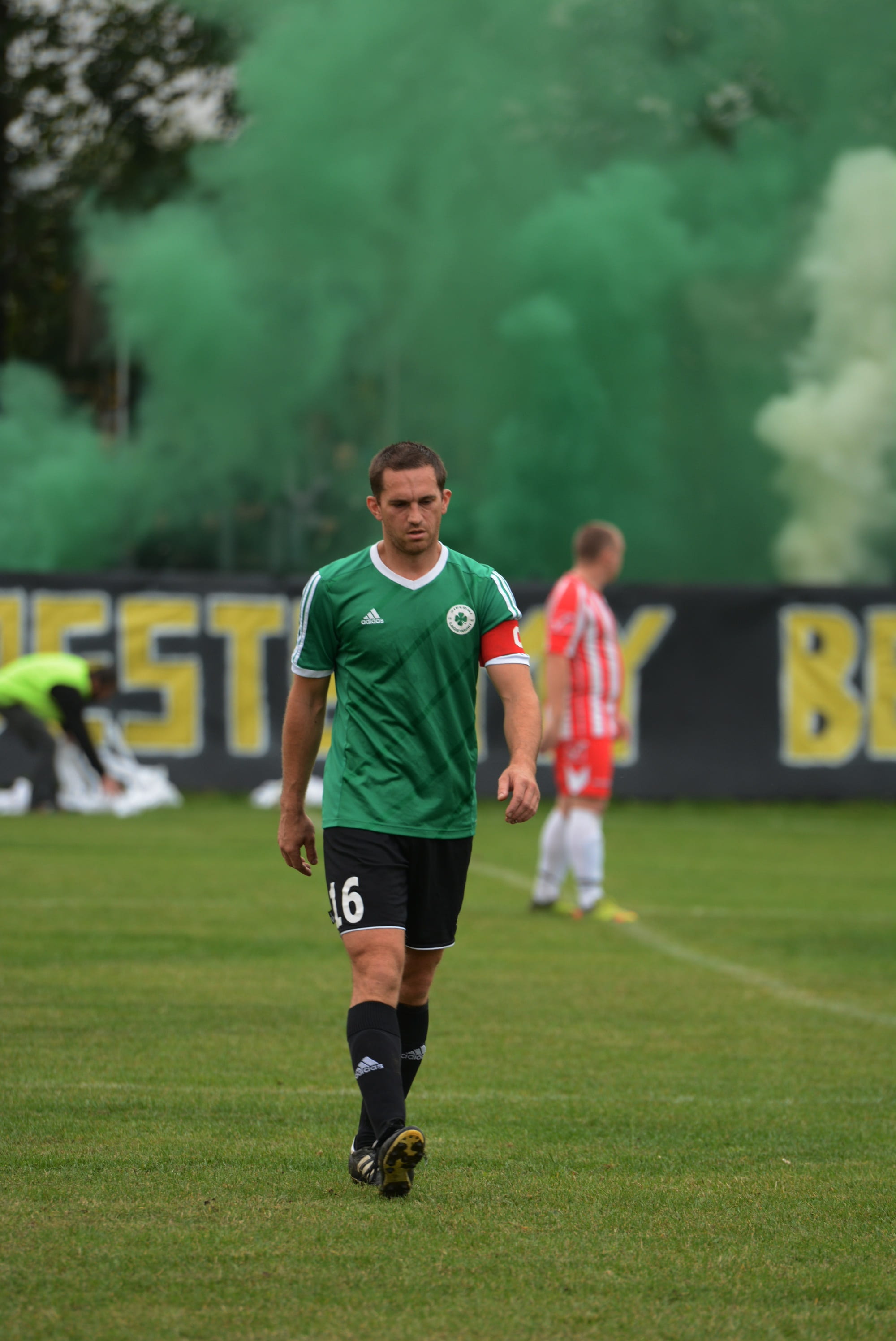 green color, athlete, phot, real people, soccer, people, men, soccer field, number, derby, front view, king jakimiec, competition, clothing, sport, grass, Phone HD Wallpaper