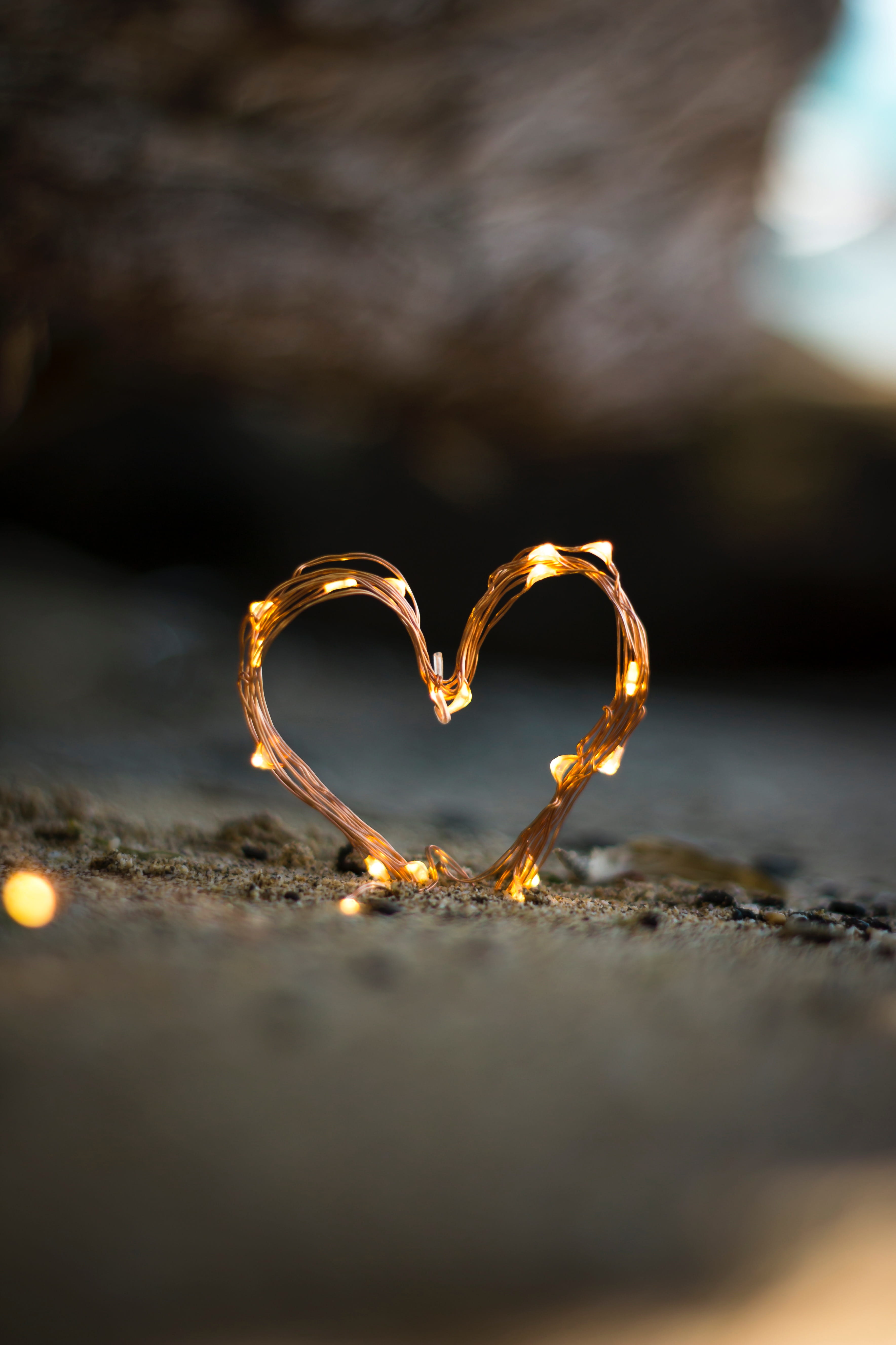 backgrounds, celebration, shape, symbol, lite, heart Shape, beach, shaped, brown, decoration, gold Colored, shiny, shore, fairy, fairy light, close, sand, Phone HD Wallpaper