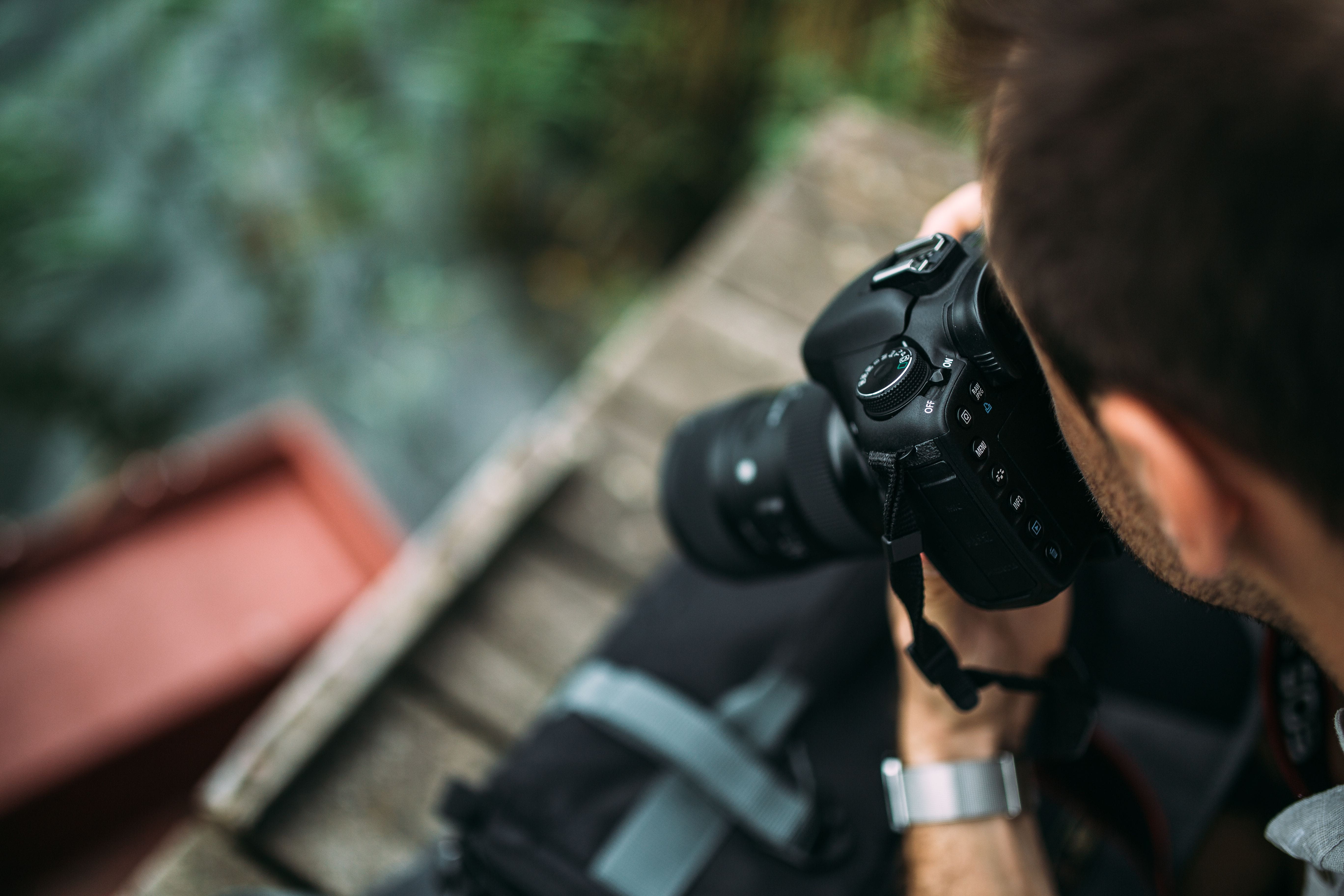 camera - photographic equipment, photography, camera, day, focus on foreground, photography themes, one person, dslr, headshot, canon, adult, black color, HD Wallpaper