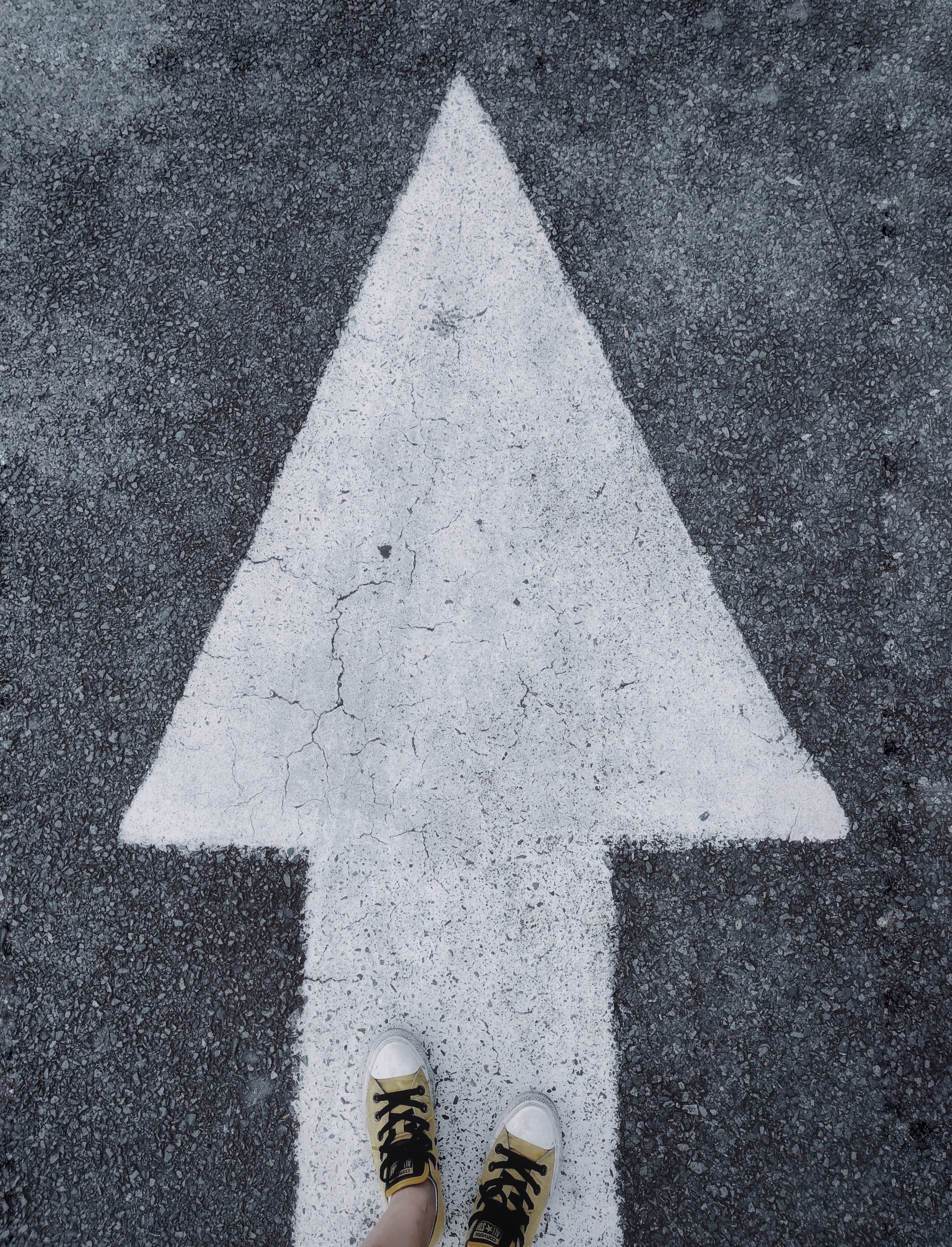 day, marking, low section, road, sign, body part, limb, arrow, real people, human body part, shoe, high angle view, direction, human foot, one person, human limb, Phone HD Wallpaper