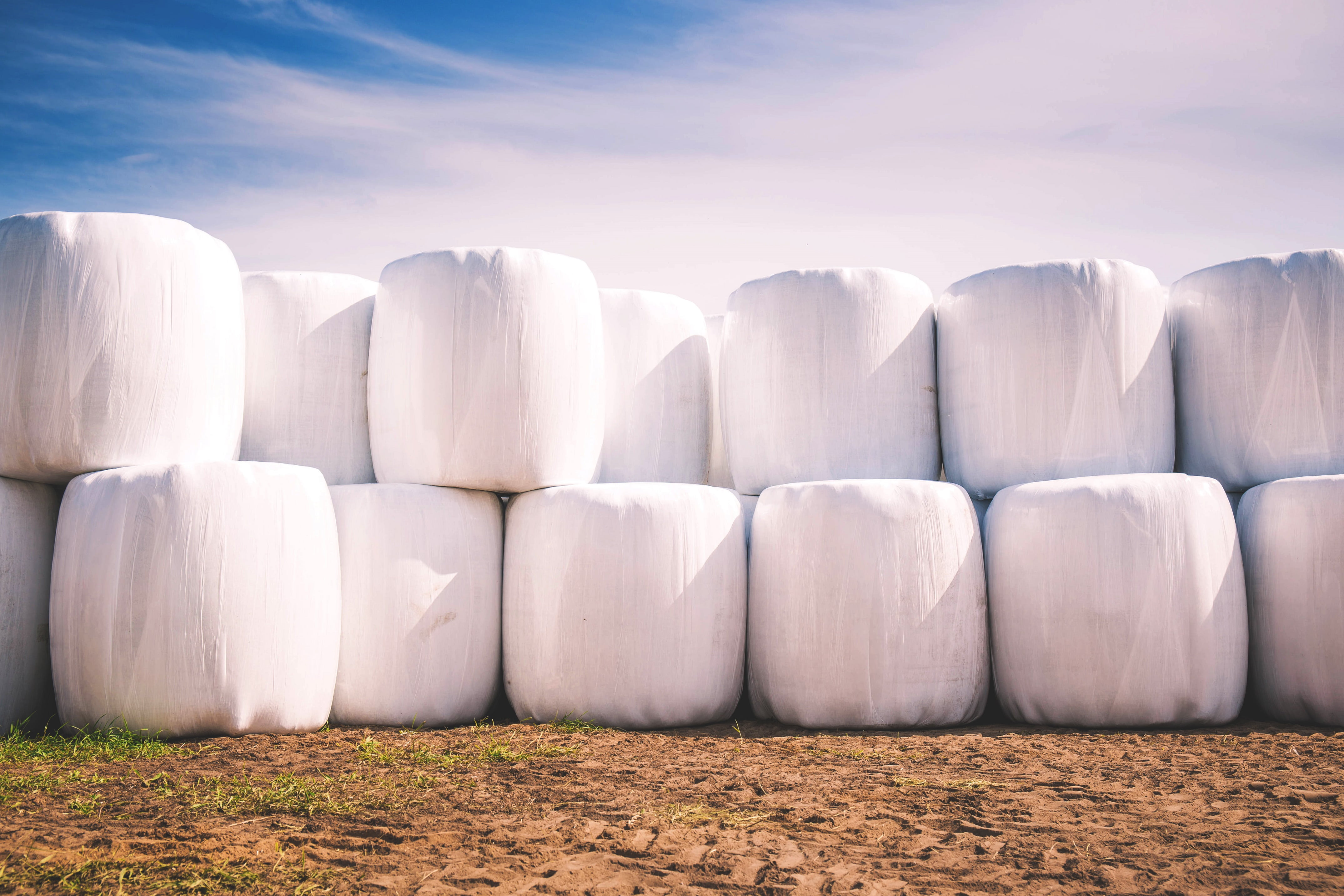 barrel, sky, no people, plains, clouds, 4K, hay, large group of objects, stack, in a row, food, rural scene, field, pile, landscape, day, cloud - sky, HD Wallpaper