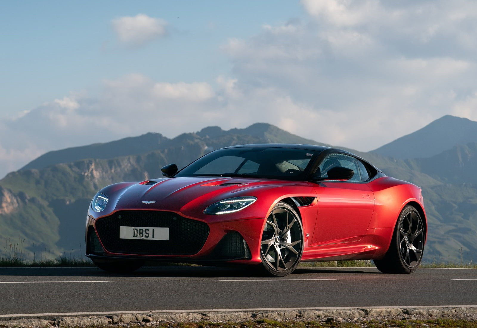 beauty in nature, superleggera, mountain range, non-urban scene, outdoors, motor vehicle, transportation, mountain peak, sky, aston, travel, martin, mode of transportation, HD Wallpaper