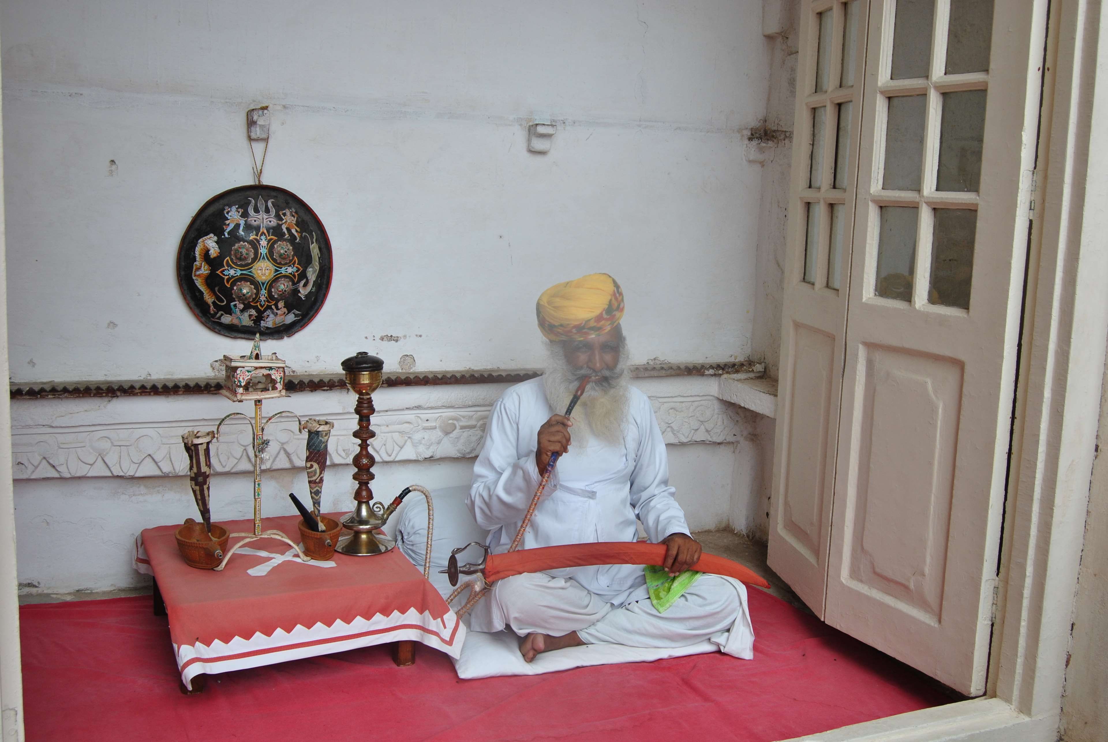 full length, rajastan india hooka smoking beard, religion, day, built structure, one person, adult, leisure activity, sitting, senior adult, women, white hair, HD Wallpaper