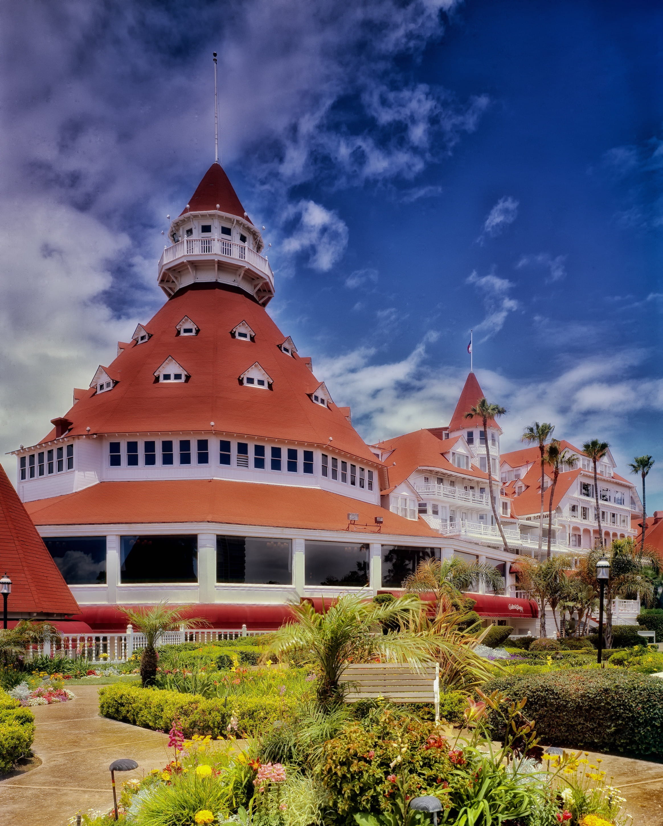 tree, california, europe, religion, diego, plant, place of worship, belief, building, history, flowers, fort, Hotel Del Coronado, rooms, spire, 2K, cloud - sky, Phone HD Wallpaper