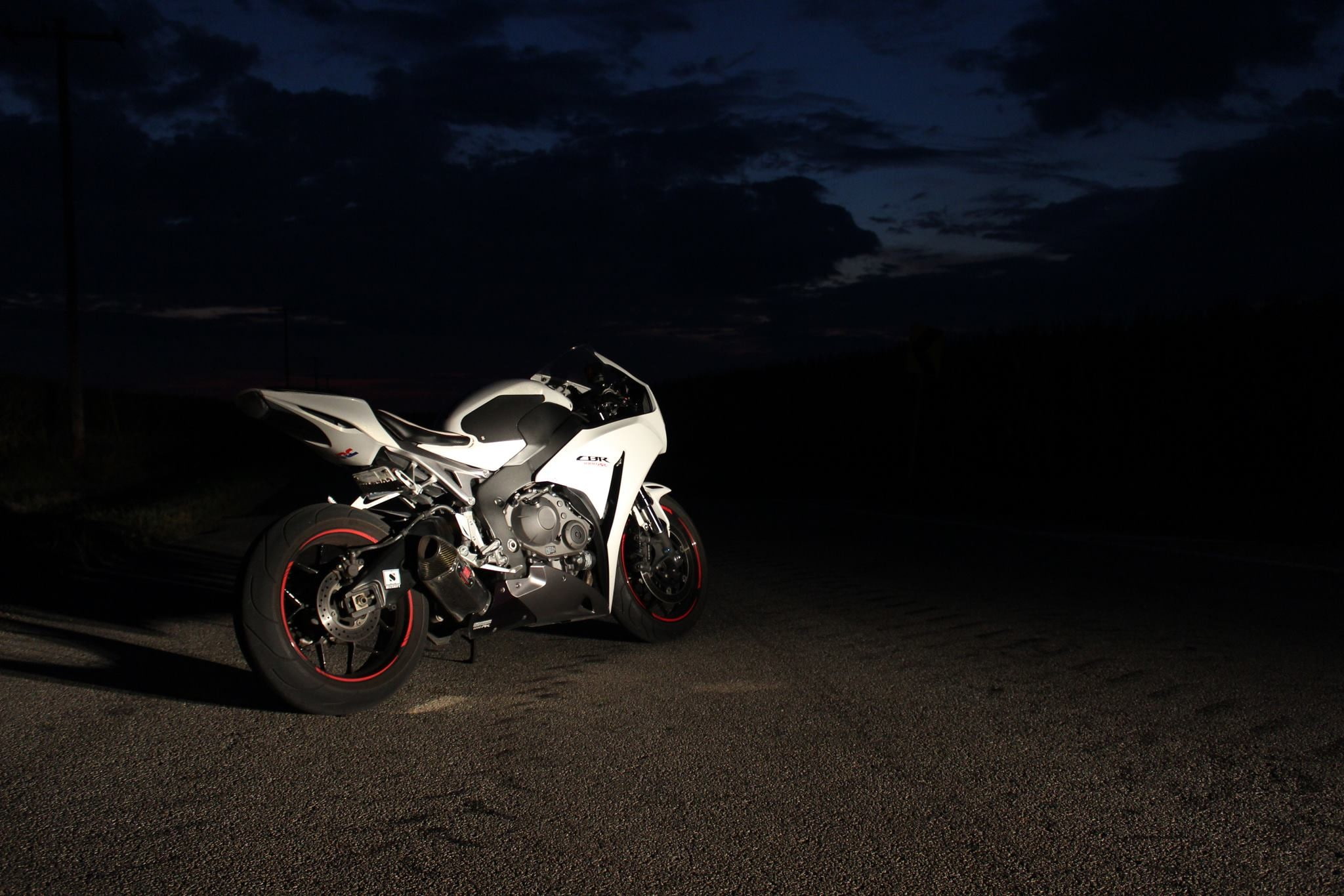 one person, motor vehicle, outdoors, road trip, speed, dark, headlight, city, honda honda cbr 1000 rr, nature, sports race, land vehicle, crash helmet, HD Wallpaper
