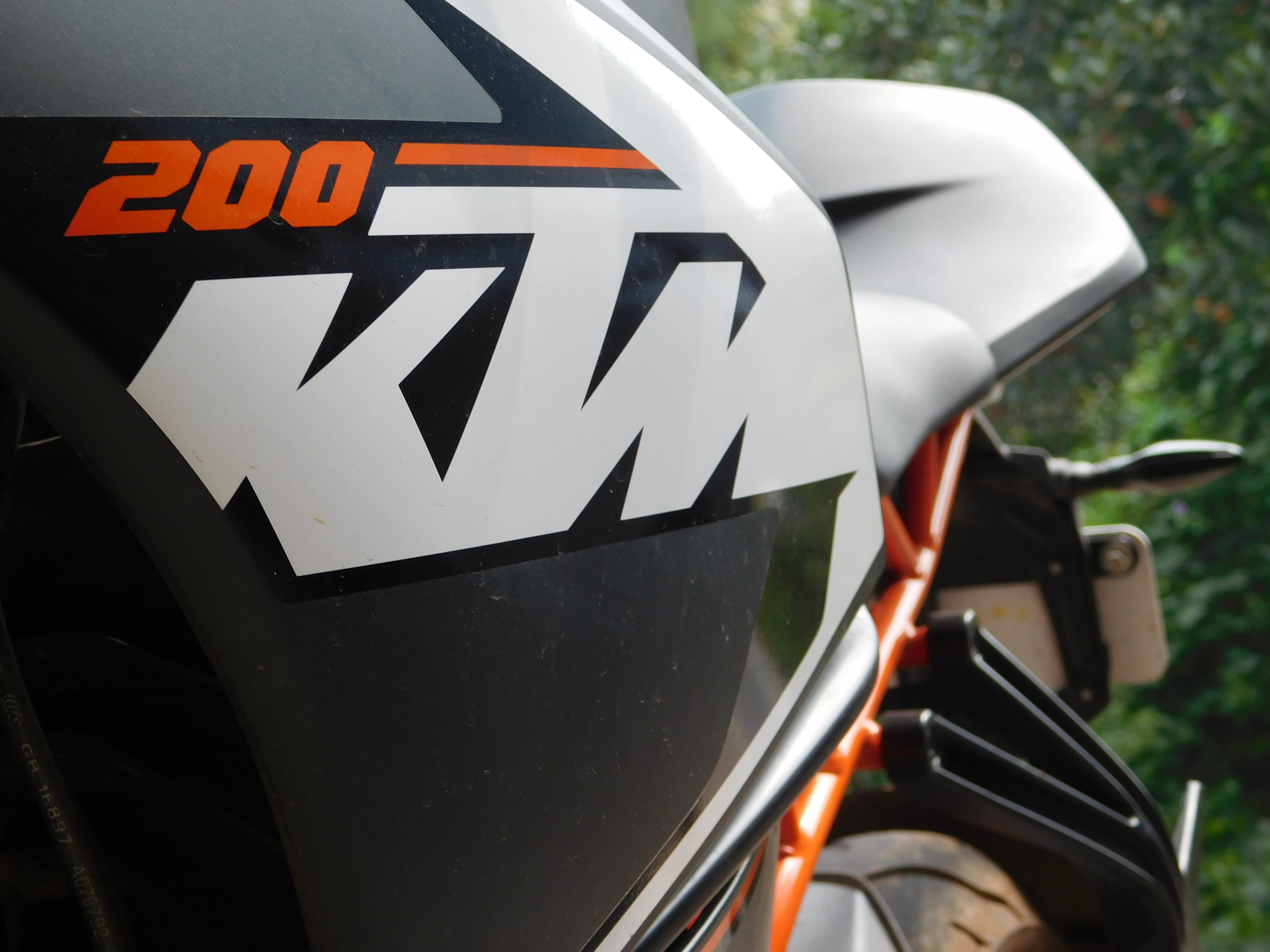 focus on foreground, KTM RC200, car, land vehicle, transportation, communication, day, western script, mode of transportation, 4K, no people, text, close-up, HD Wallpaper