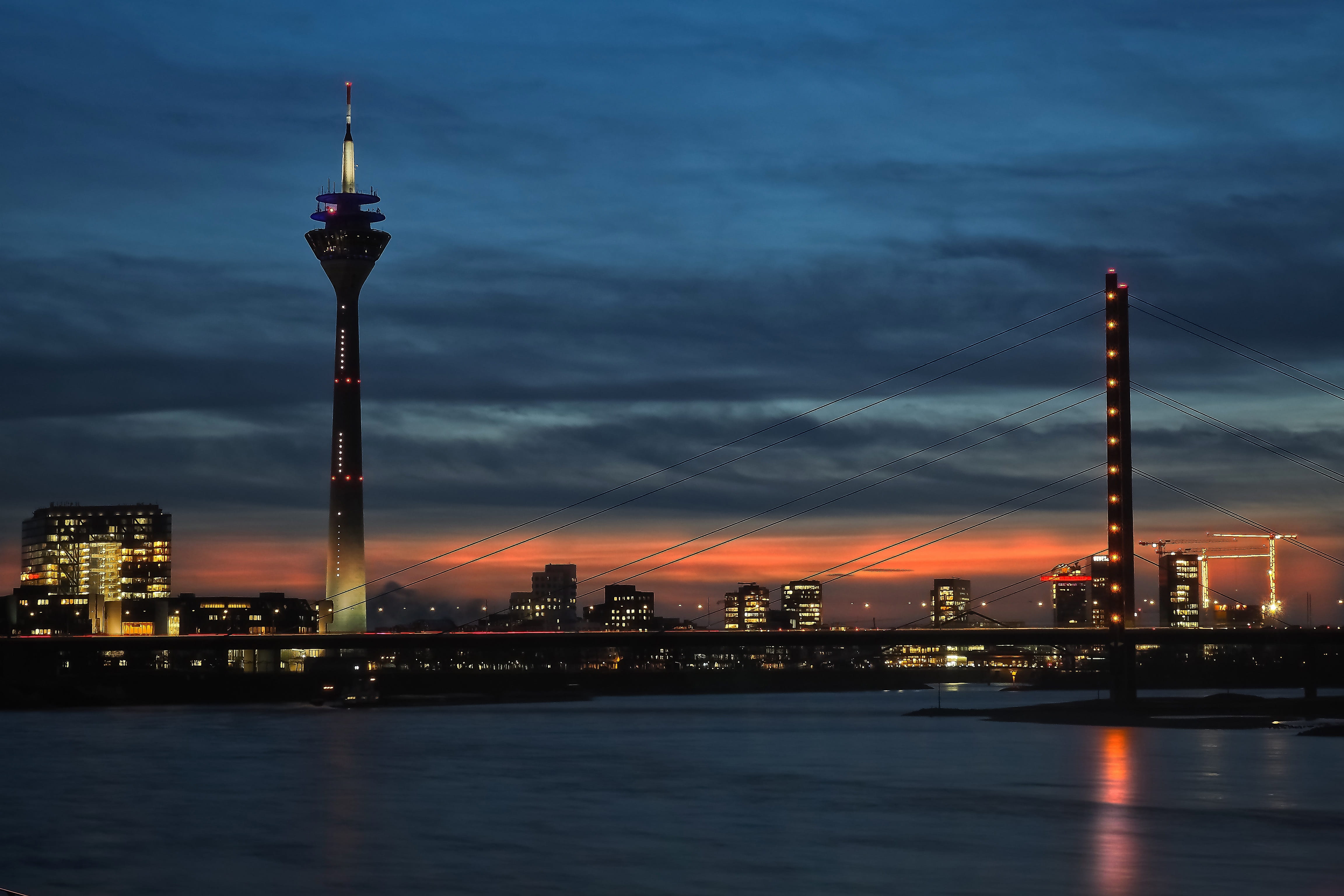 crossing the rhine, no people, transportation, rhine, nature, dusk, city, düsseldorf, tower, landscape, evening, river, rheinbrücke, landmark, cityscape, HD Wallpaper