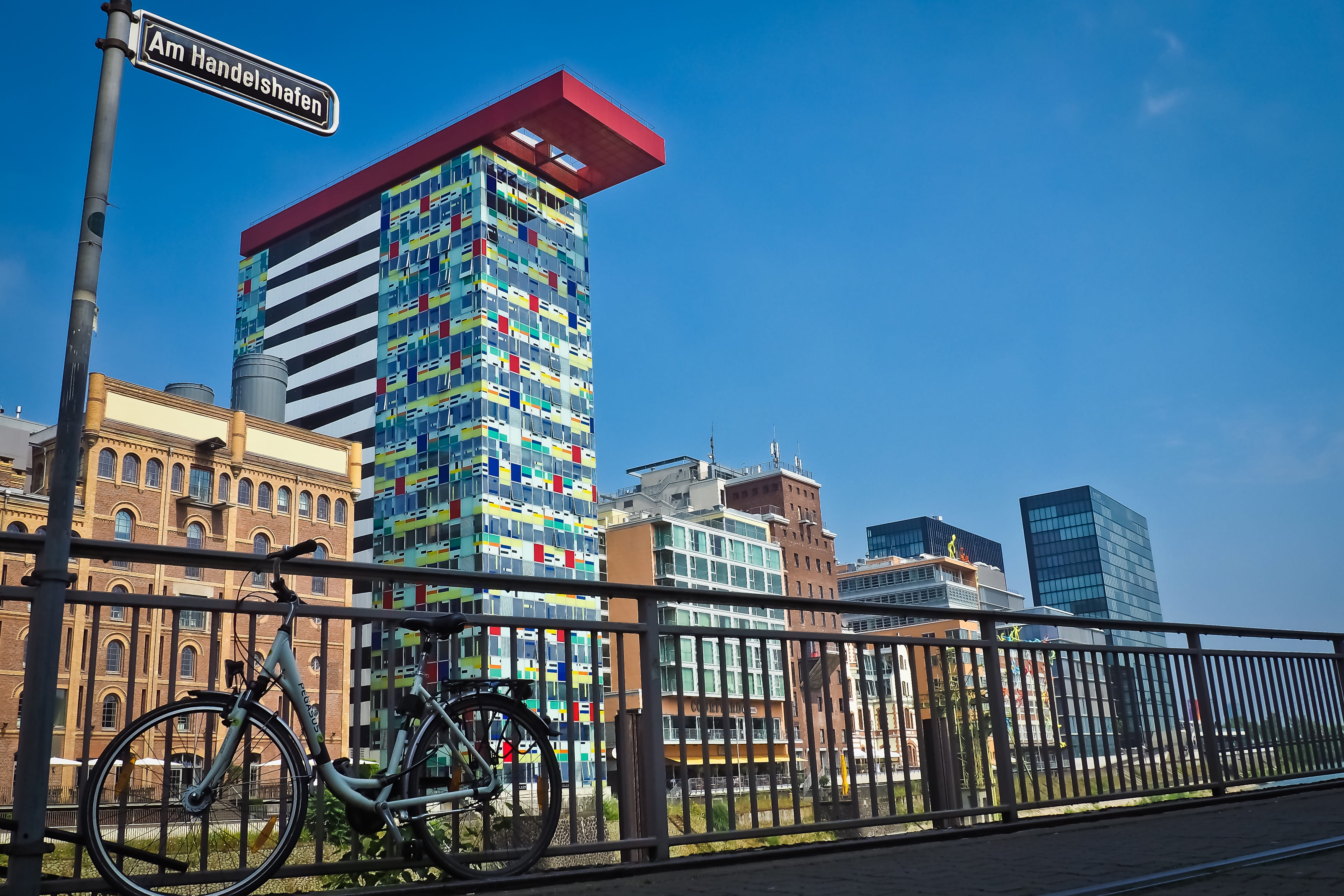 financial district, home, modern architecture, sign, city view, urban, nature, built structure, text, glass, bicycle, building exterior, düsseldorf, 4K, HD Wallpaper