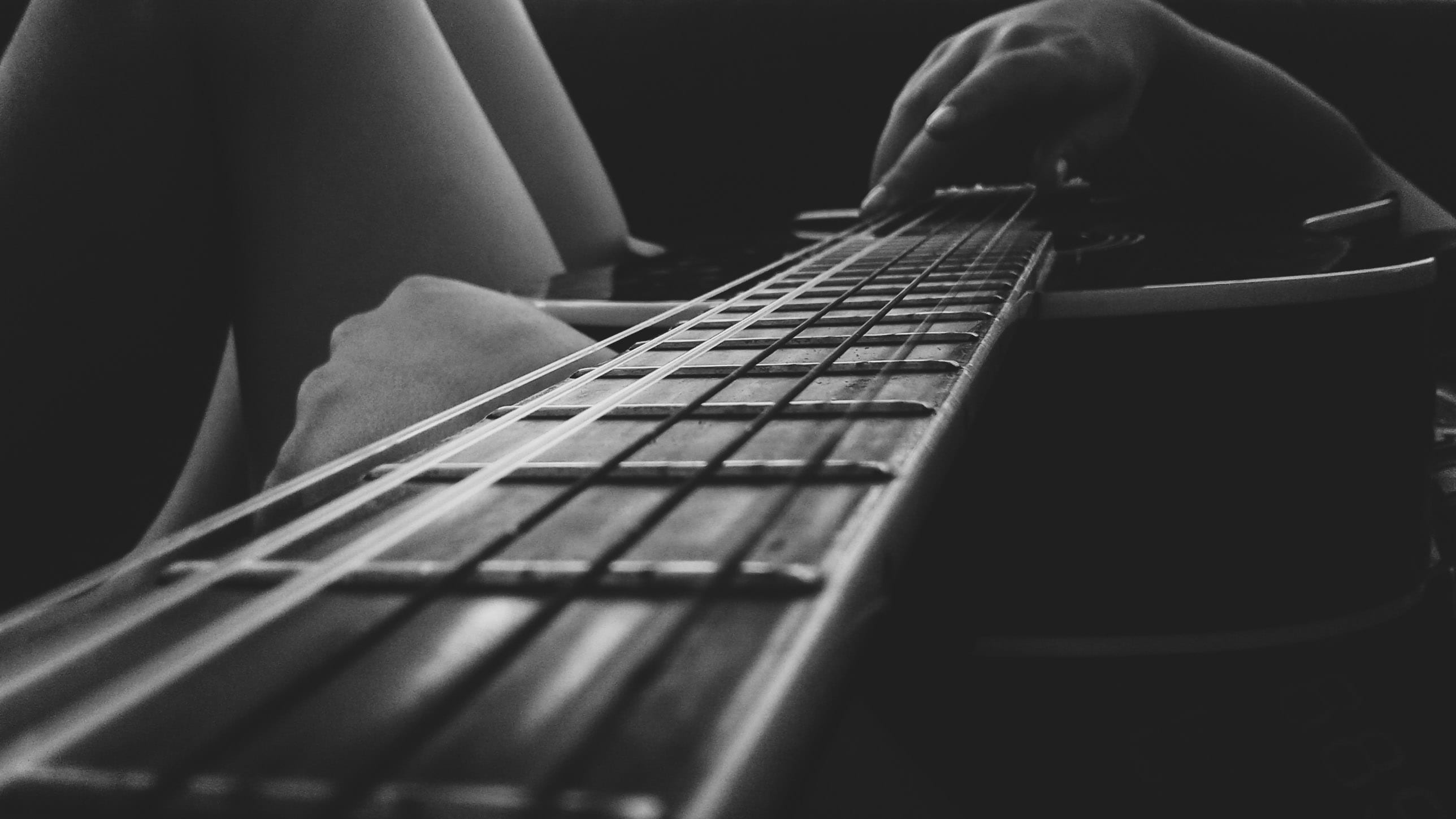 human hand, dark, guitar, man, string instrument, couch, focus, one person, strings, person, instrument, play, indoors, 2K, musical equipment, selective focus, HD Wallpaper