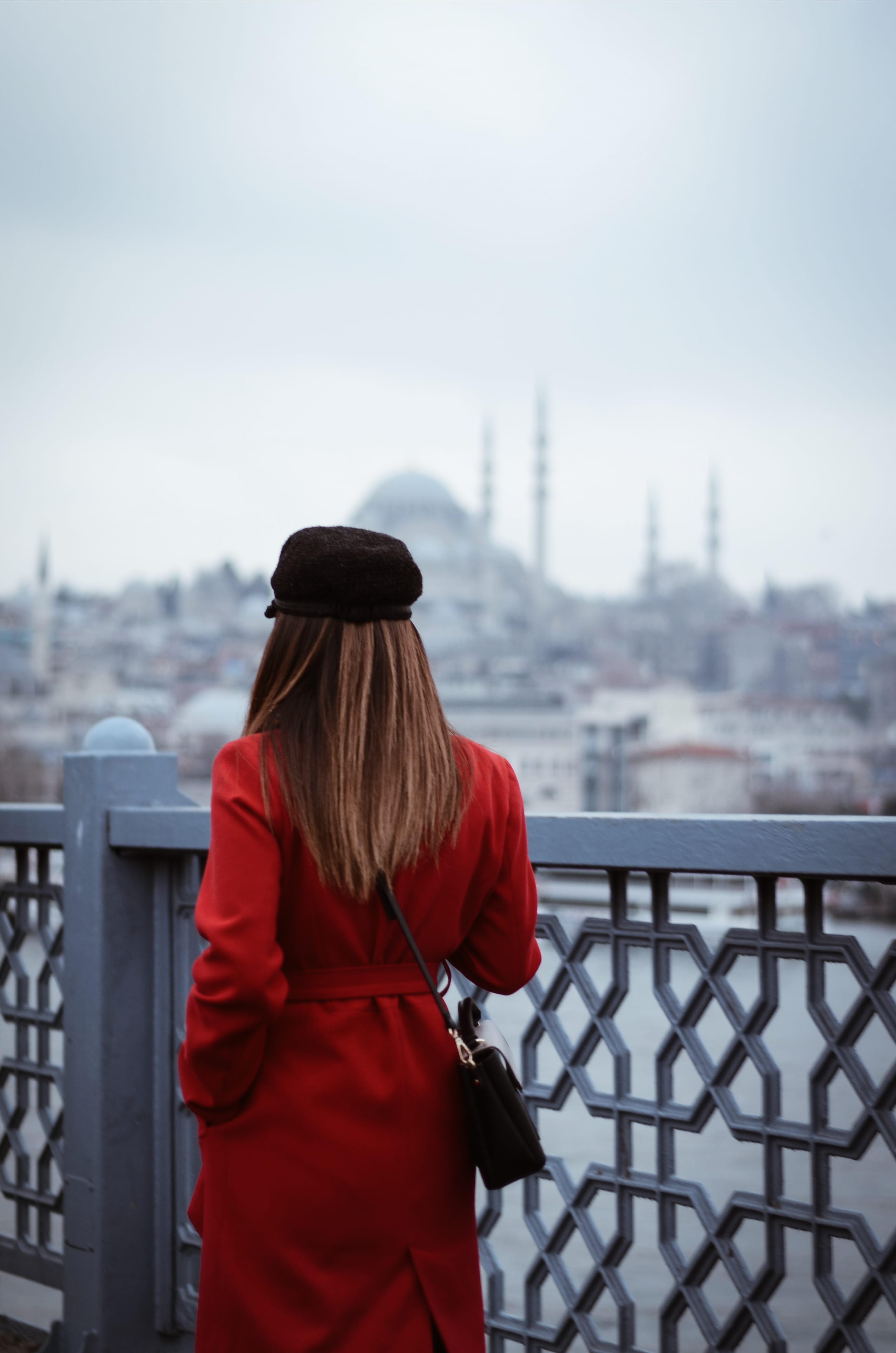 clothing, wear, winter, nature, style, railing, warm clothing, fashion, beside, cold temperature, outdoors, sky, fence, real people, woman, warmly, back view, Phone HD Wallpaper