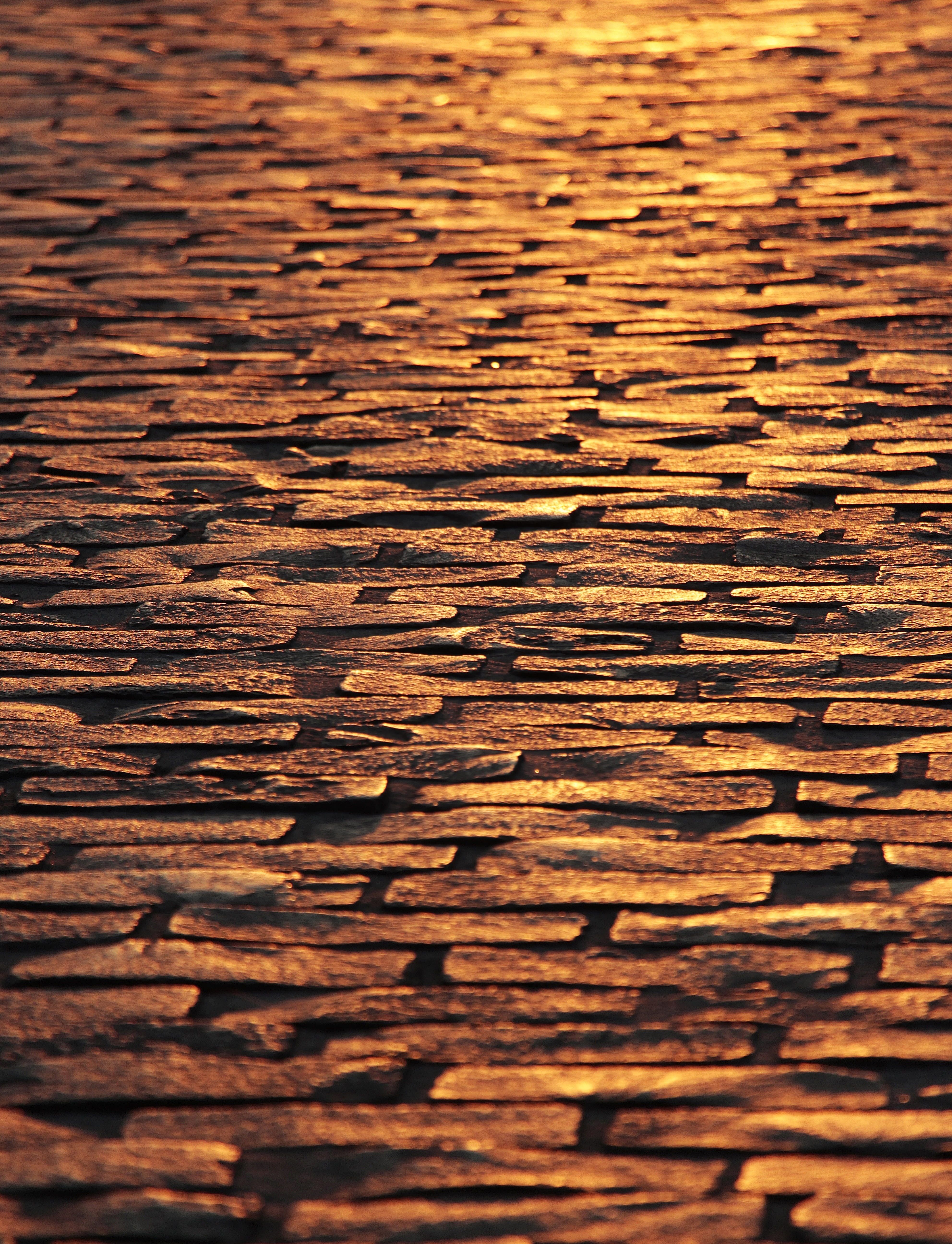 sparkle, selective focus, historic center, surface, pavement, cobblestones, gloss, no people, sunset, textured, high angle view, ground, day, close-up, Phone HD Wallpaper