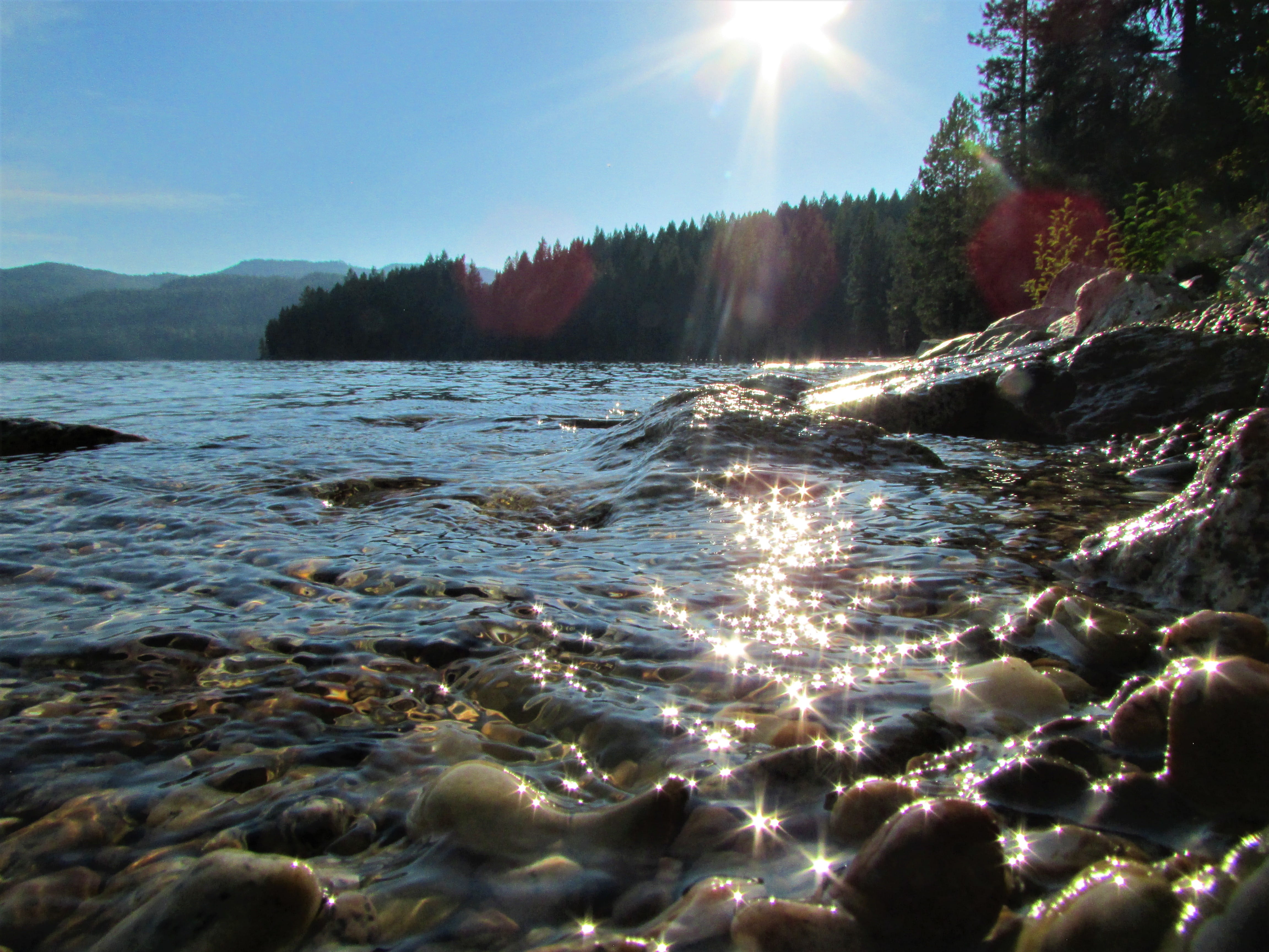 sky, sun, lake with sparkles, no people, beauty in nature, stones, trees, 4K, sunbeam, land, plant, tranquil scene, water, tree, day, light, tranquility, HD Wallpaper