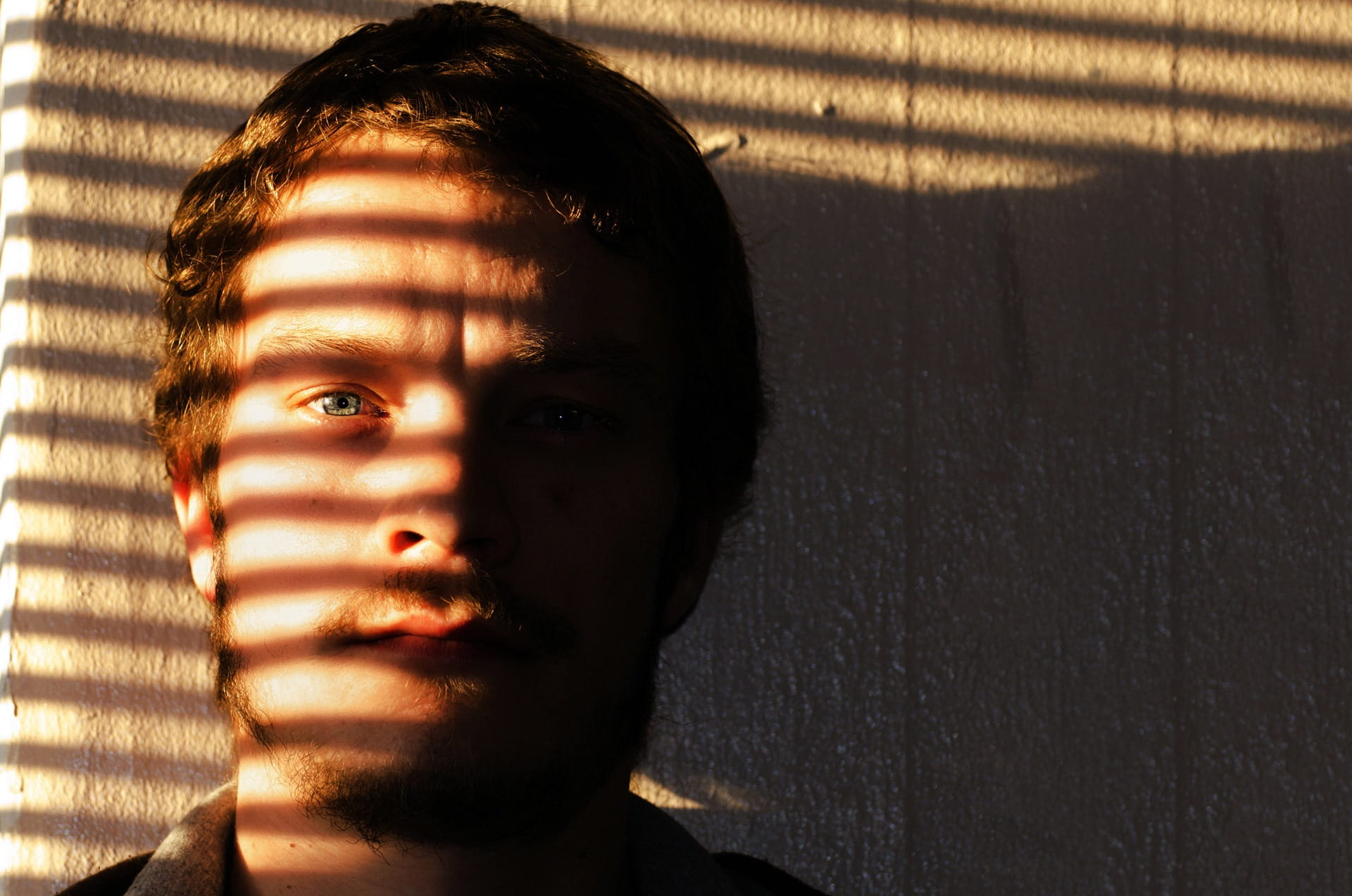 man, adult, people, 1080P, now, stripes, men, young adult, dark, headshot, contemplation, background, sunlight, portrait, one person, shadow, george, window, HD Wallpaper