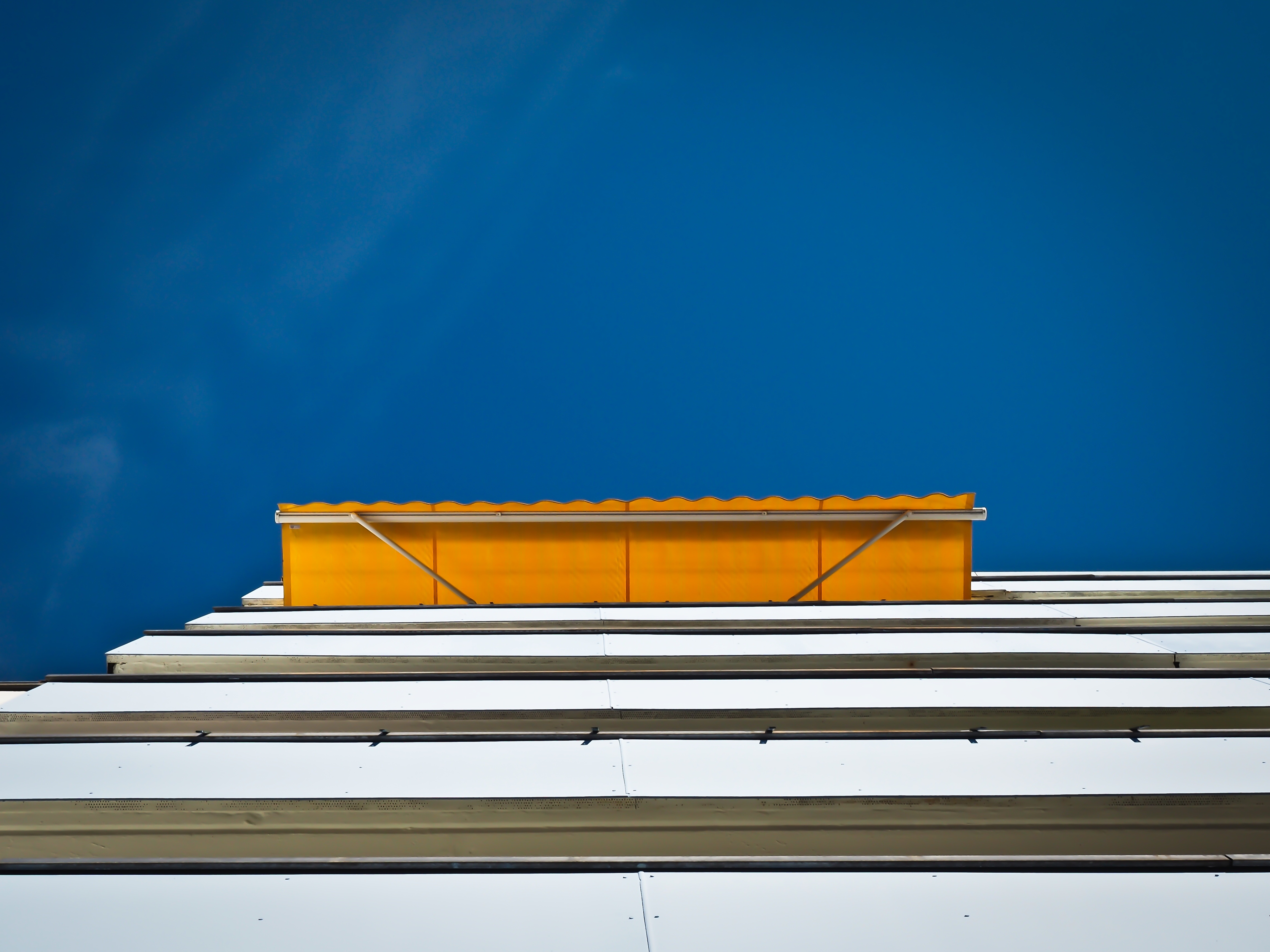 window, sun protection, sunlight, directly below, clear sky, low angle view, facade, blinds, balcony, outdoors, city, building, sky, blue, nature, blank, HD Wallpaper