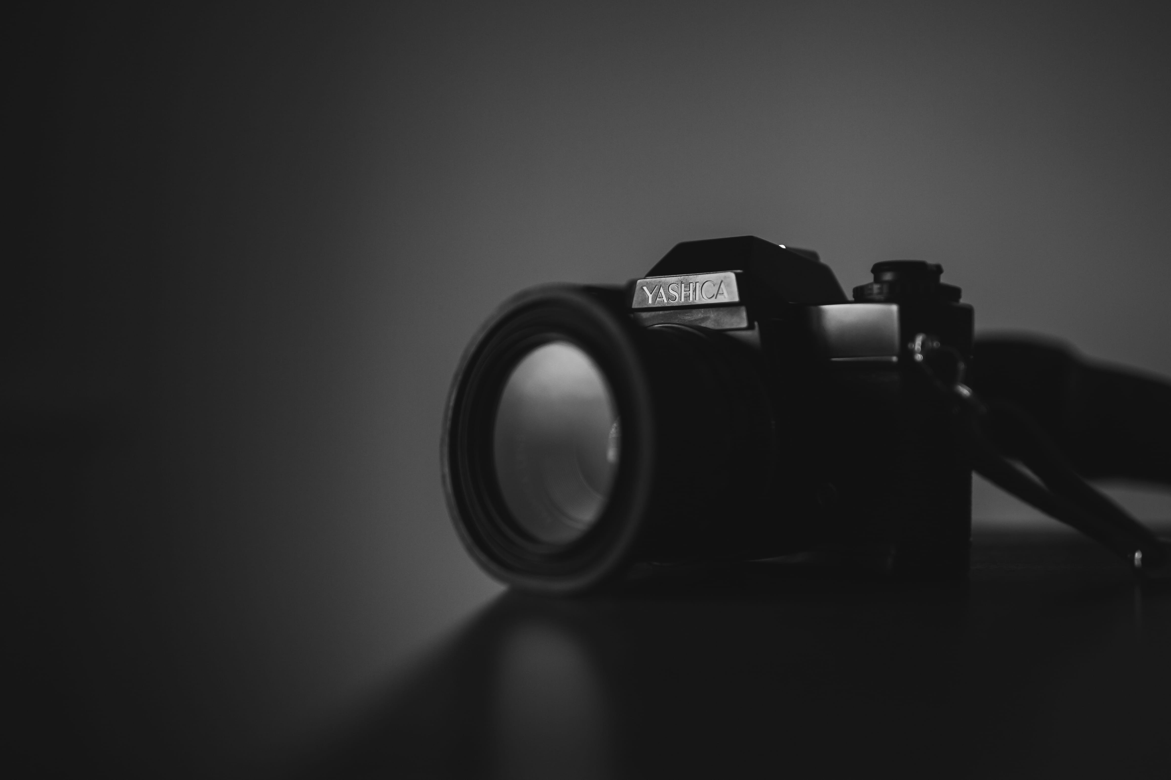 slr camera, focus on foreground, table, photographic equipment, digital camera, new, toy, photo, black and white, grayscale, retro Styled, old-fashioned, HD Wallpaper