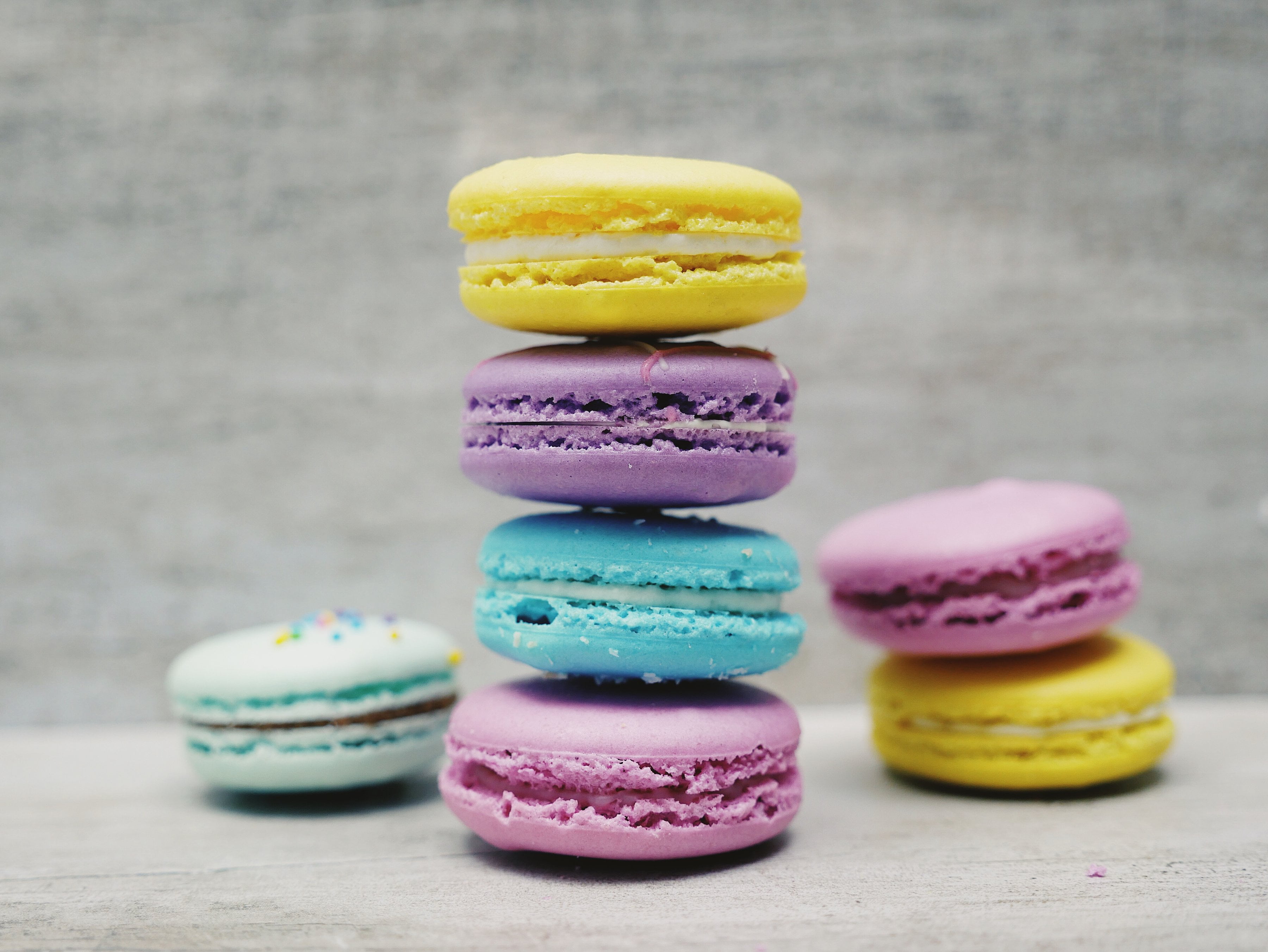yellow, choice, freshness, ready-to-eat, pastries, in a row, colors, pink Color, bakery, candy, refreshment, blue, indulgence, almond biscuits, backgrounds, HD Wallpaper