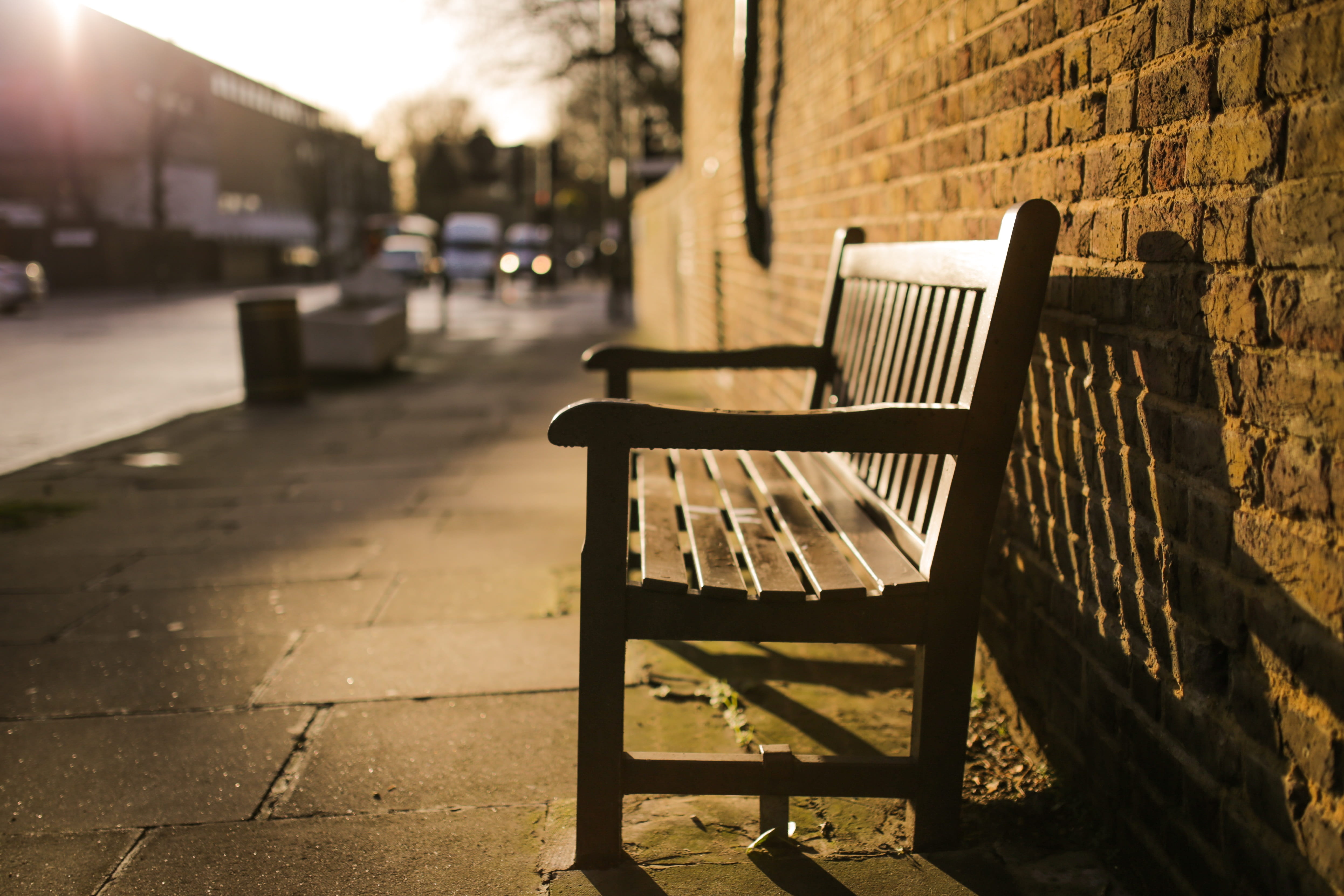 bench, focus on foreground, brown, 4K, relaxation, sunny, sunlight, built structure, summer, paving stone, relax, city, wall - building feature, urban, HD Wallpaper