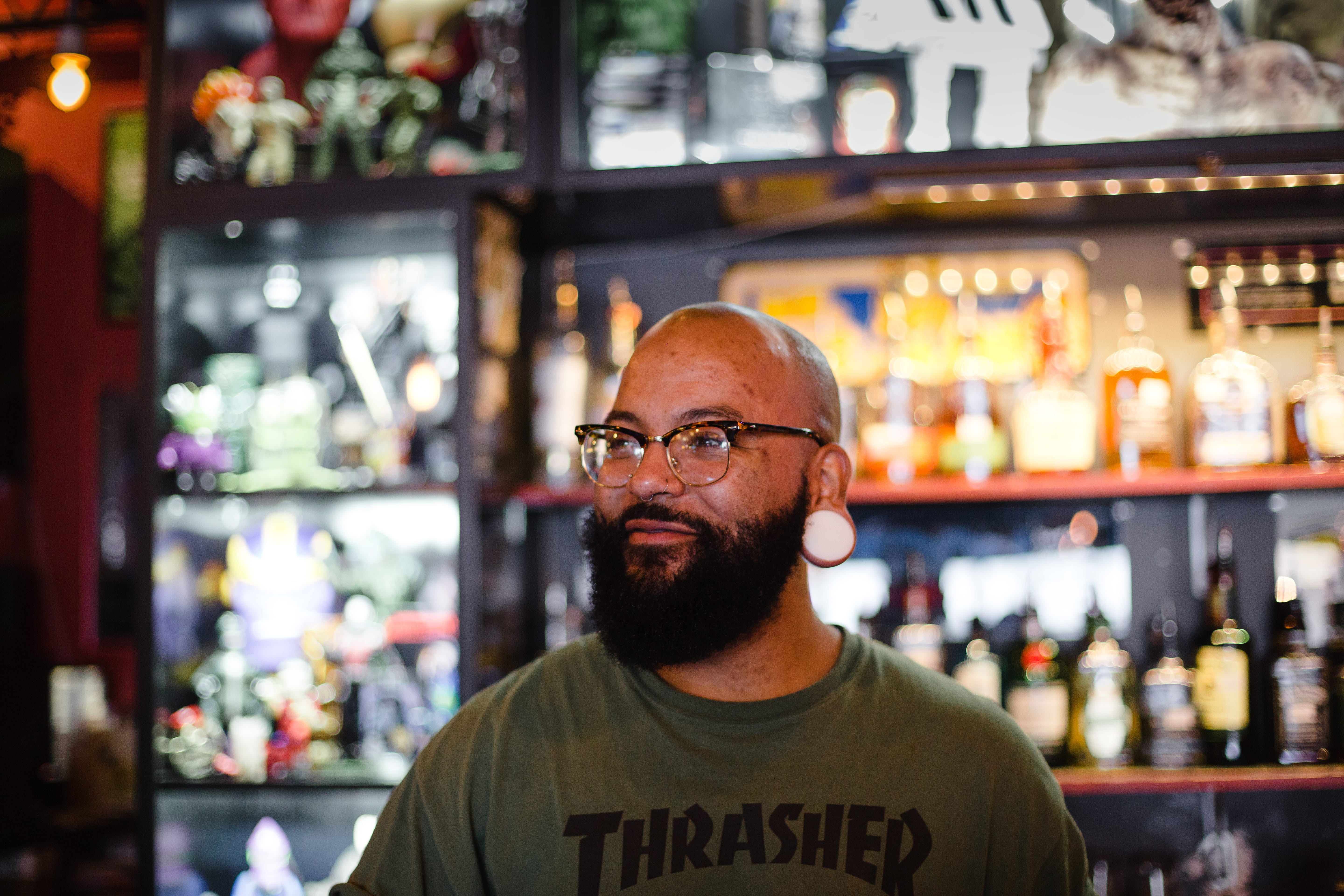 male, facial hair, indoors, smiling, focus on foreground, the baxter arcade, bar counter, thrasher, bartender, sushi, near, front view, rack, beard, entrepreneur, HD Wallpaper