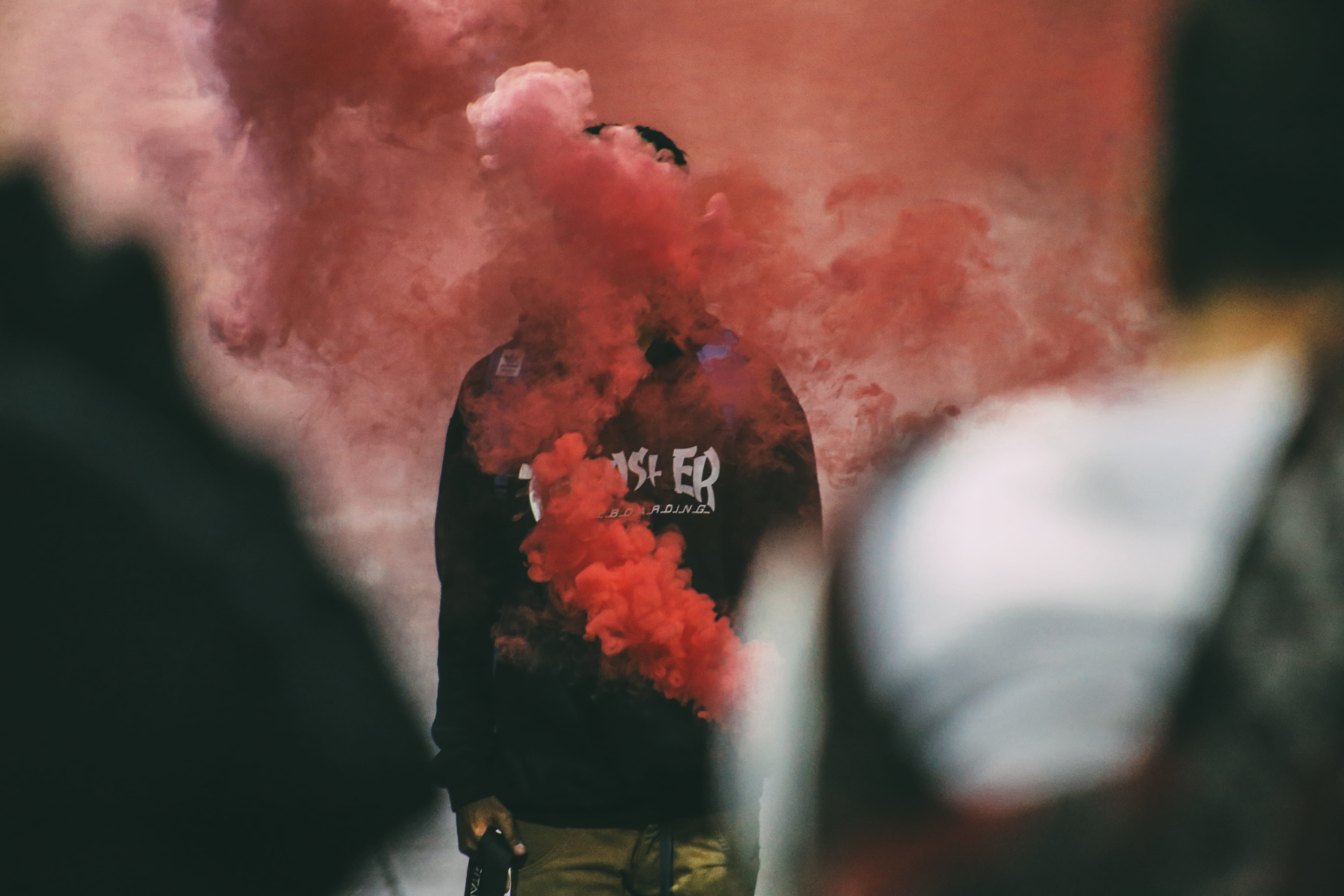 wear, 5K, blur, jacket, religion, burning, spirituality, one person, person, incidental people, fashion, holding, motion, smoke - physical structure, focus, HD Wallpaper