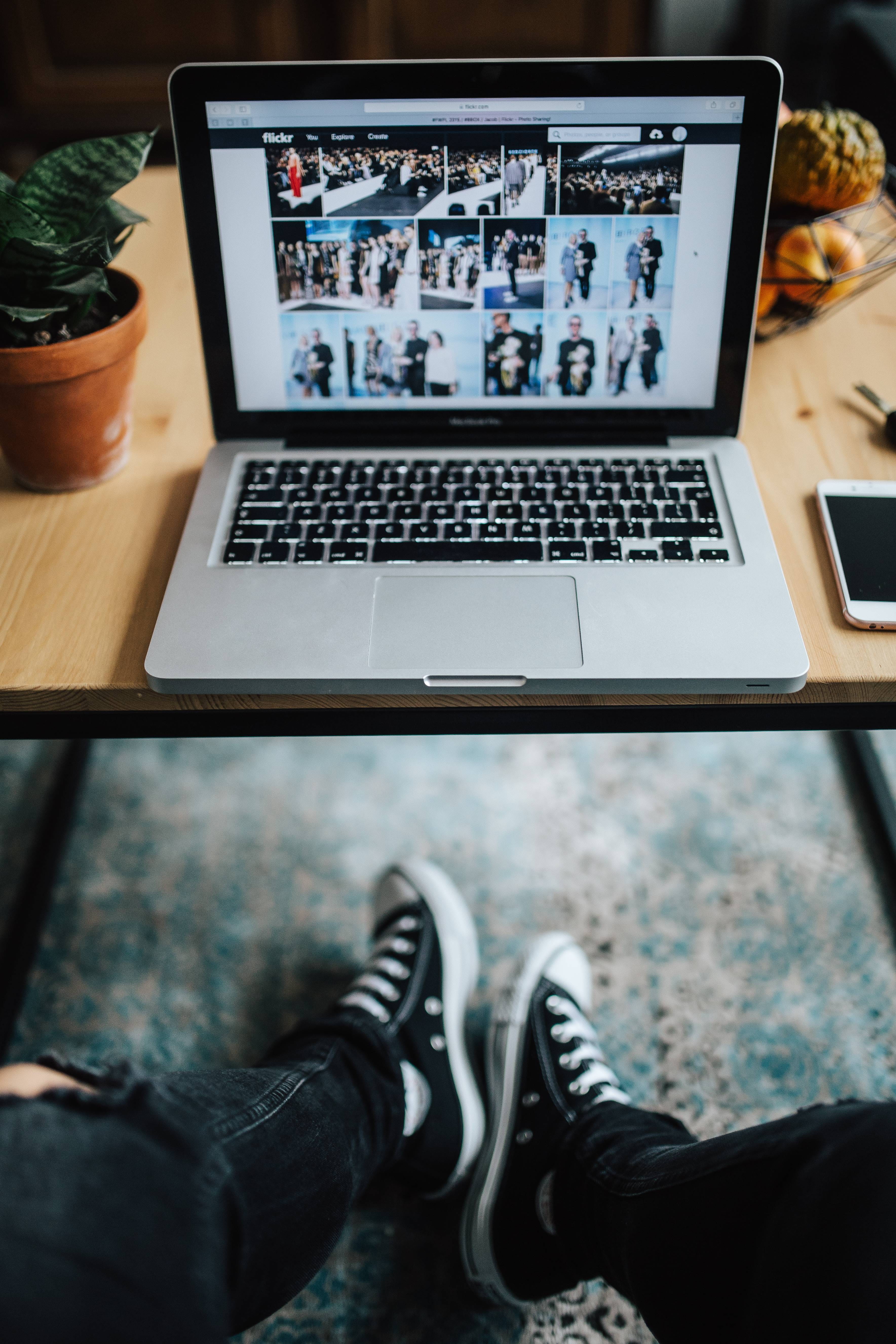 human leg, 5K, computer, human body part, black, keyboard, indoors, all star, computer Monitor, silver, wooden, high angle view, legs, Apple, feet, device screen, Phone HD Wallpaper