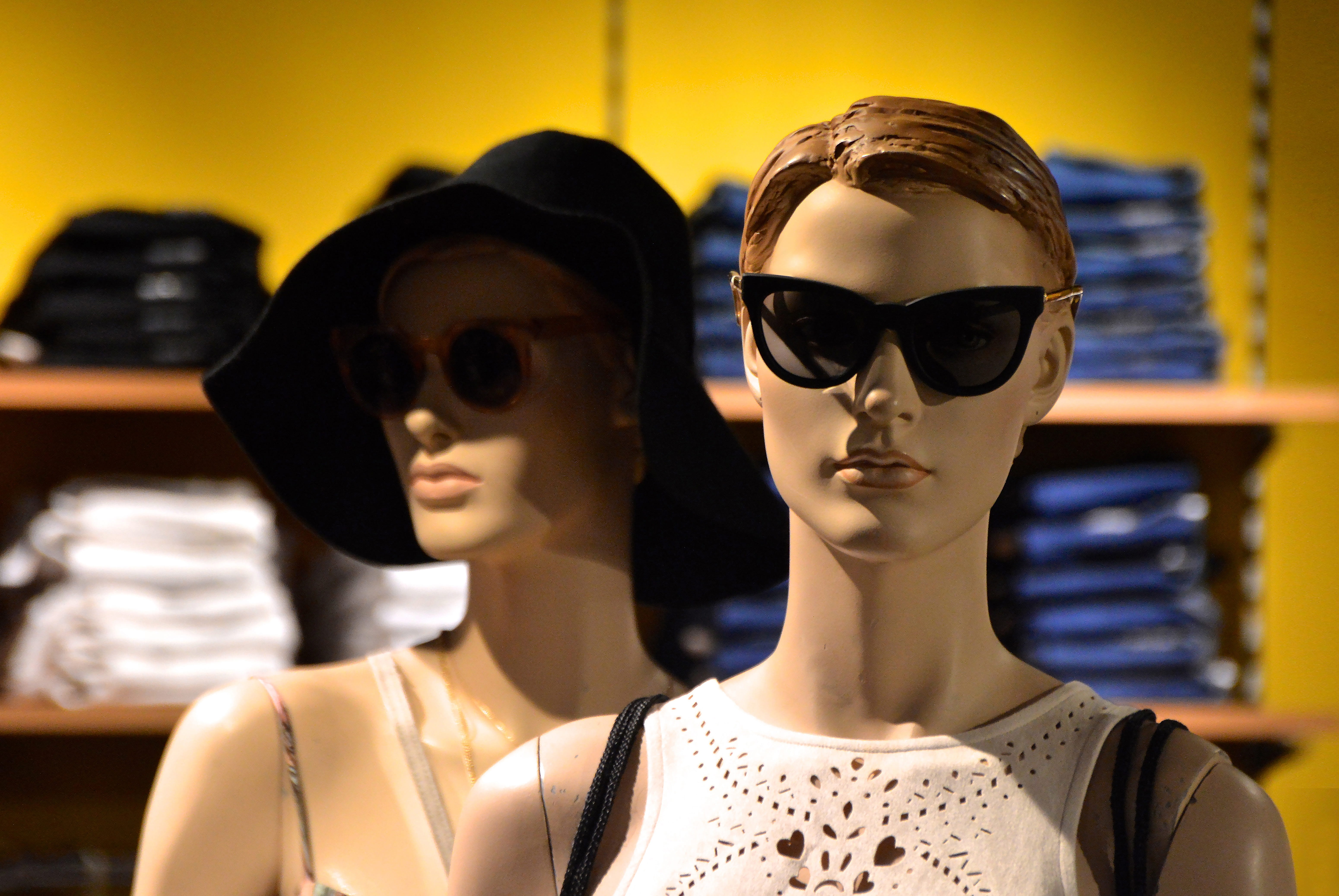 female likeness, white, display dummy, young adult, interior, 5K, boutique, setup, sale, photo, sunglasses, display, selective, two, figures, consumerism, HD Wallpaper