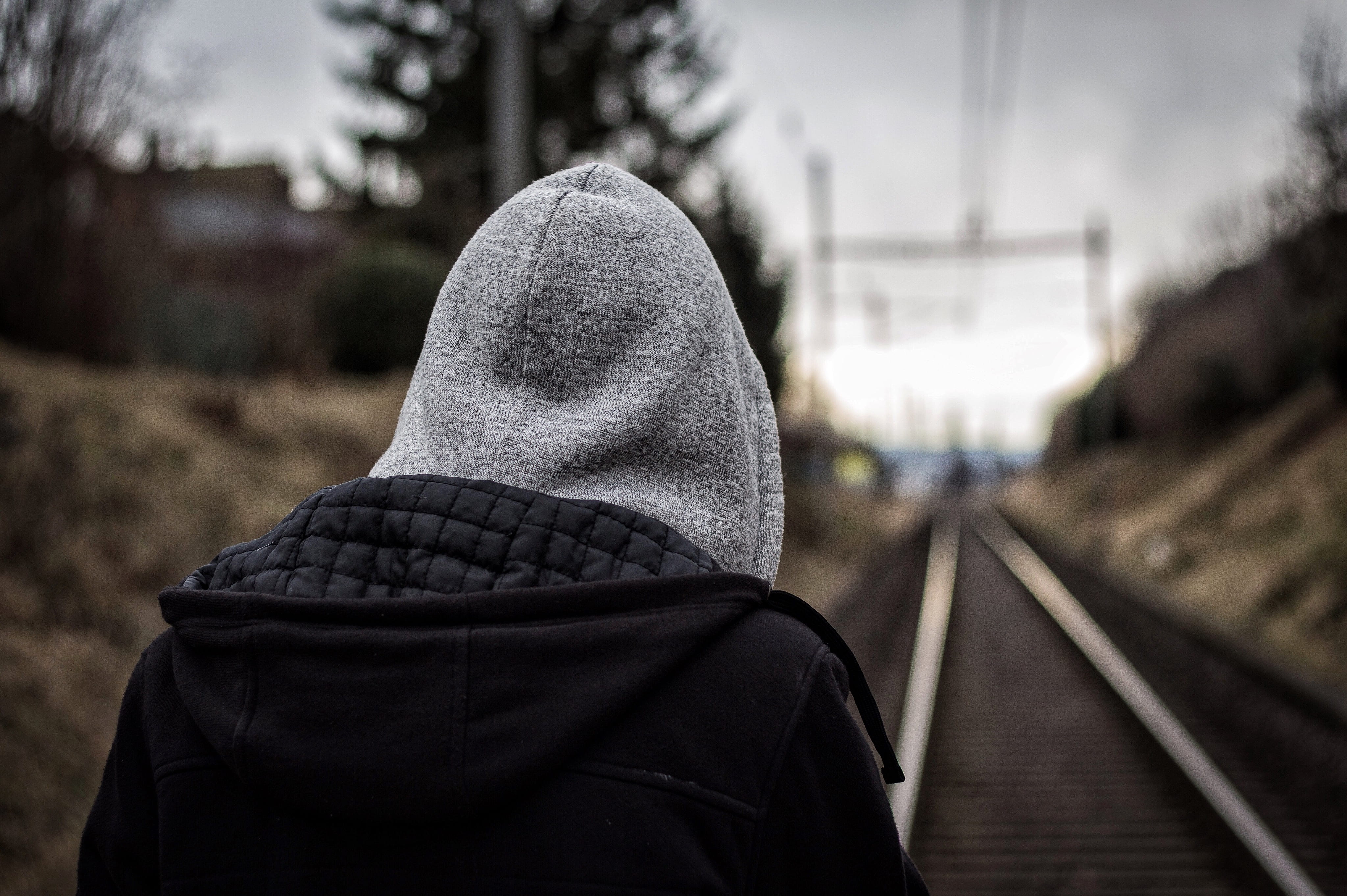 expression, gray, person, one person, hoody, nature, blacked out, day, clothing, hat, track, cold temperature, rear view, 4K, hood - clothing, hood, holding, HD Wallpaper