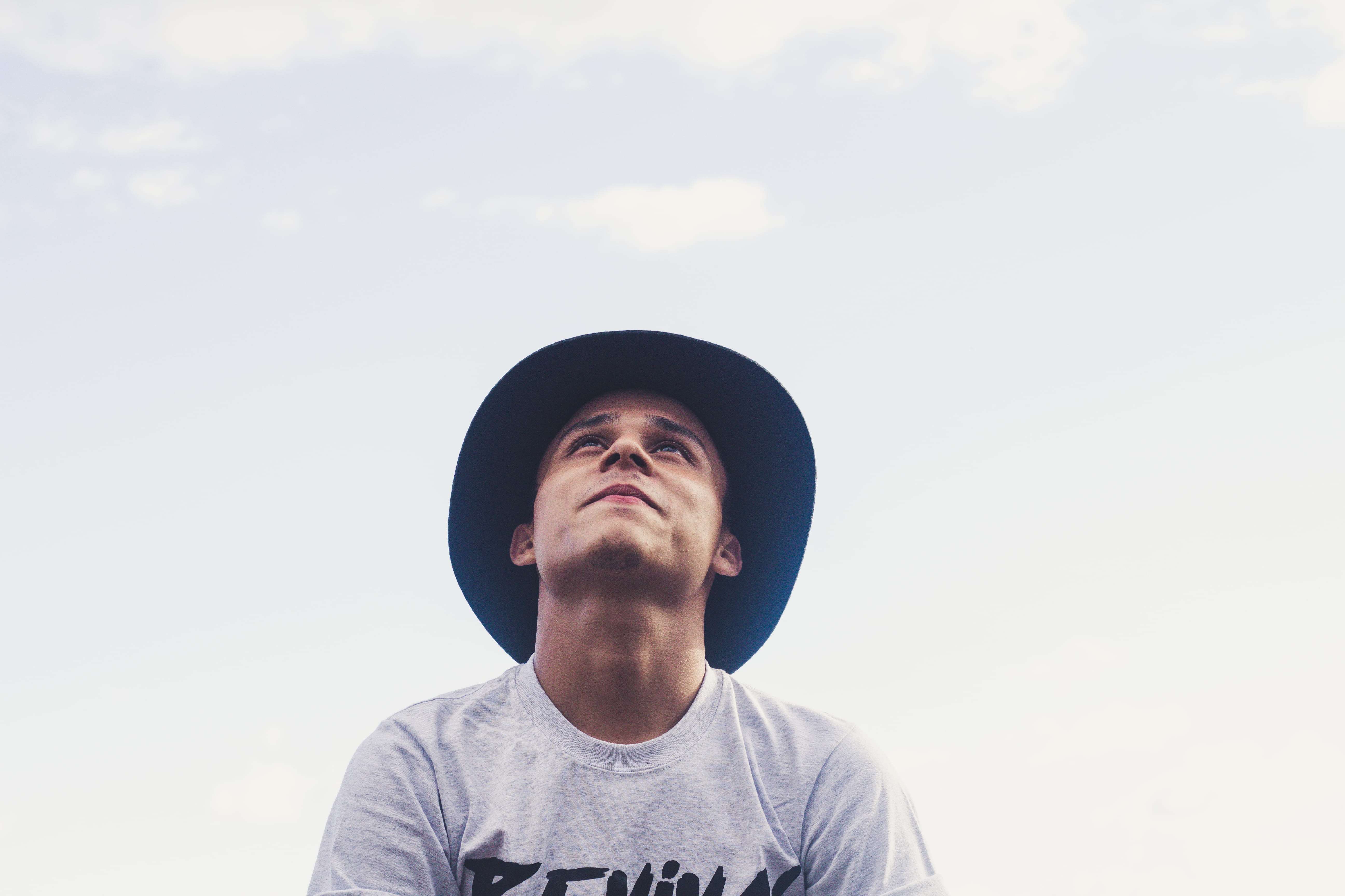t-shirt, young adult, one person, male, young men, man, contemplation, men, naturelover, teenager, low angle view, headshot, guy, real people, standing, HD Wallpaper