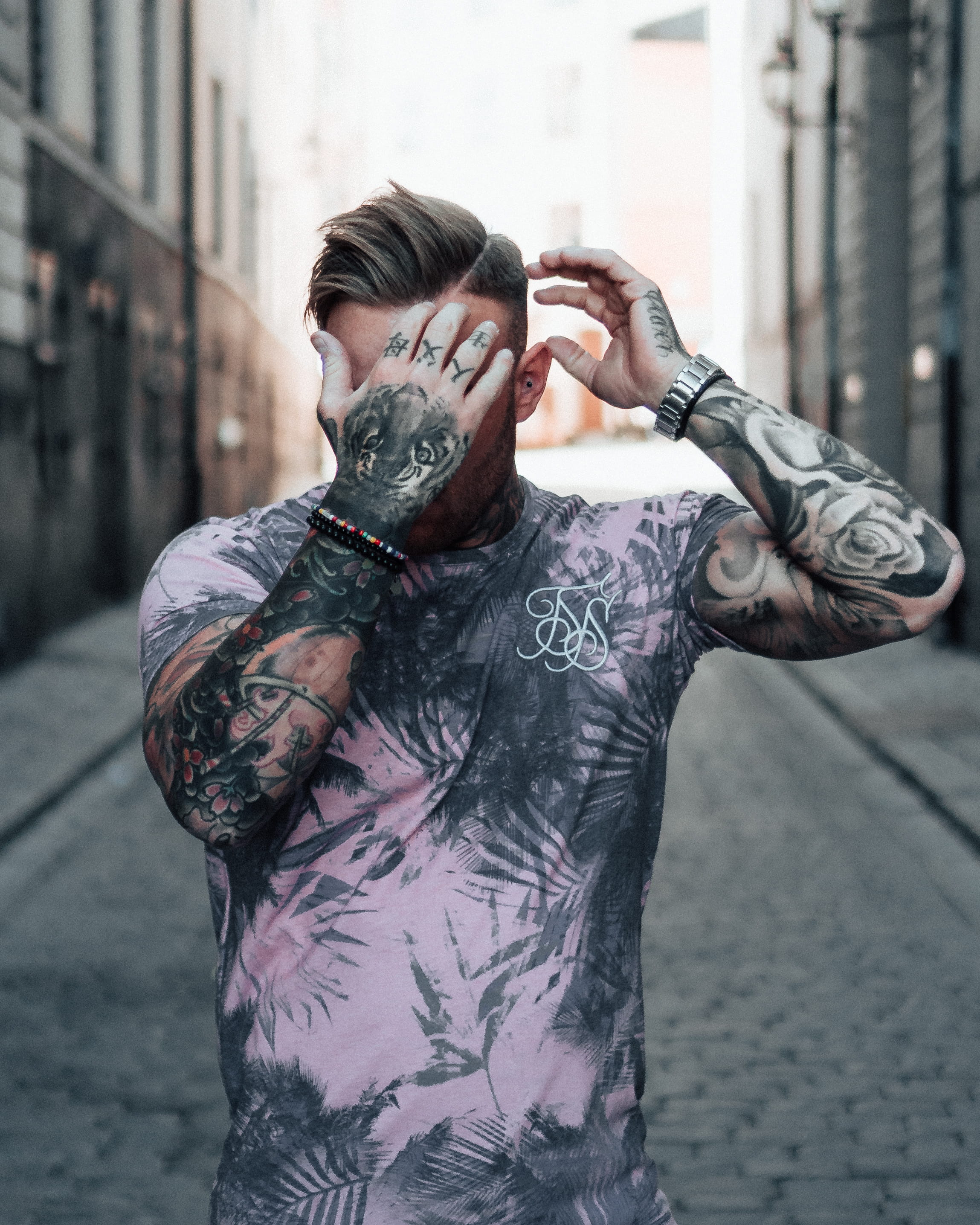 one Person, young Adult, wearing, human Face, women, outdoors, men, t, adult, fashion, alley, lifestyle, hairstyle, tattoo, shirt, elegance, cover, city Life, Phone HD Wallpaper