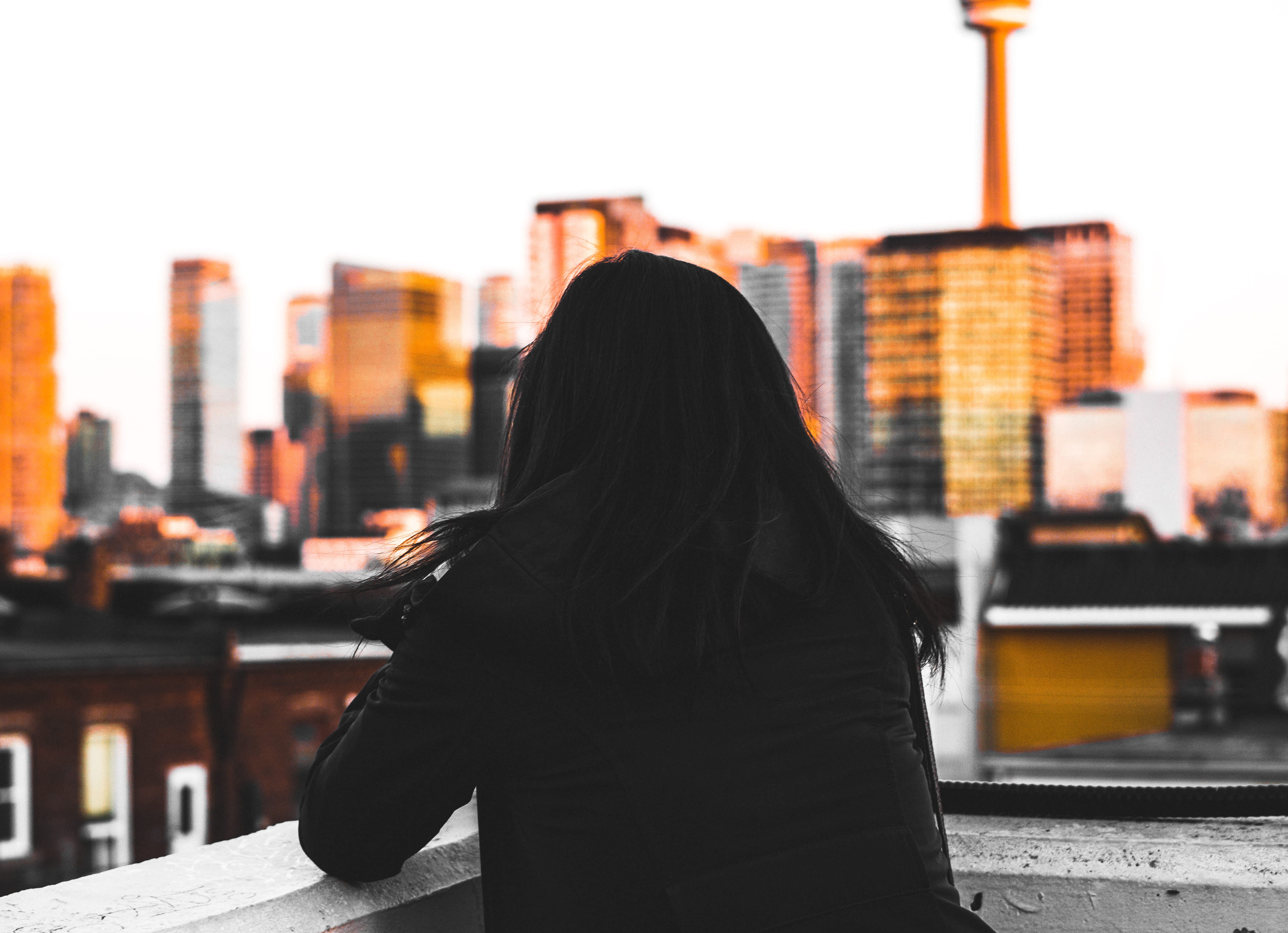 long hair, hairstyle, women, one person, gold, black hair, stare, back, waist up, leisure activity, girl, adult, architecture, buildings, canada, sunset, HD Wallpaper