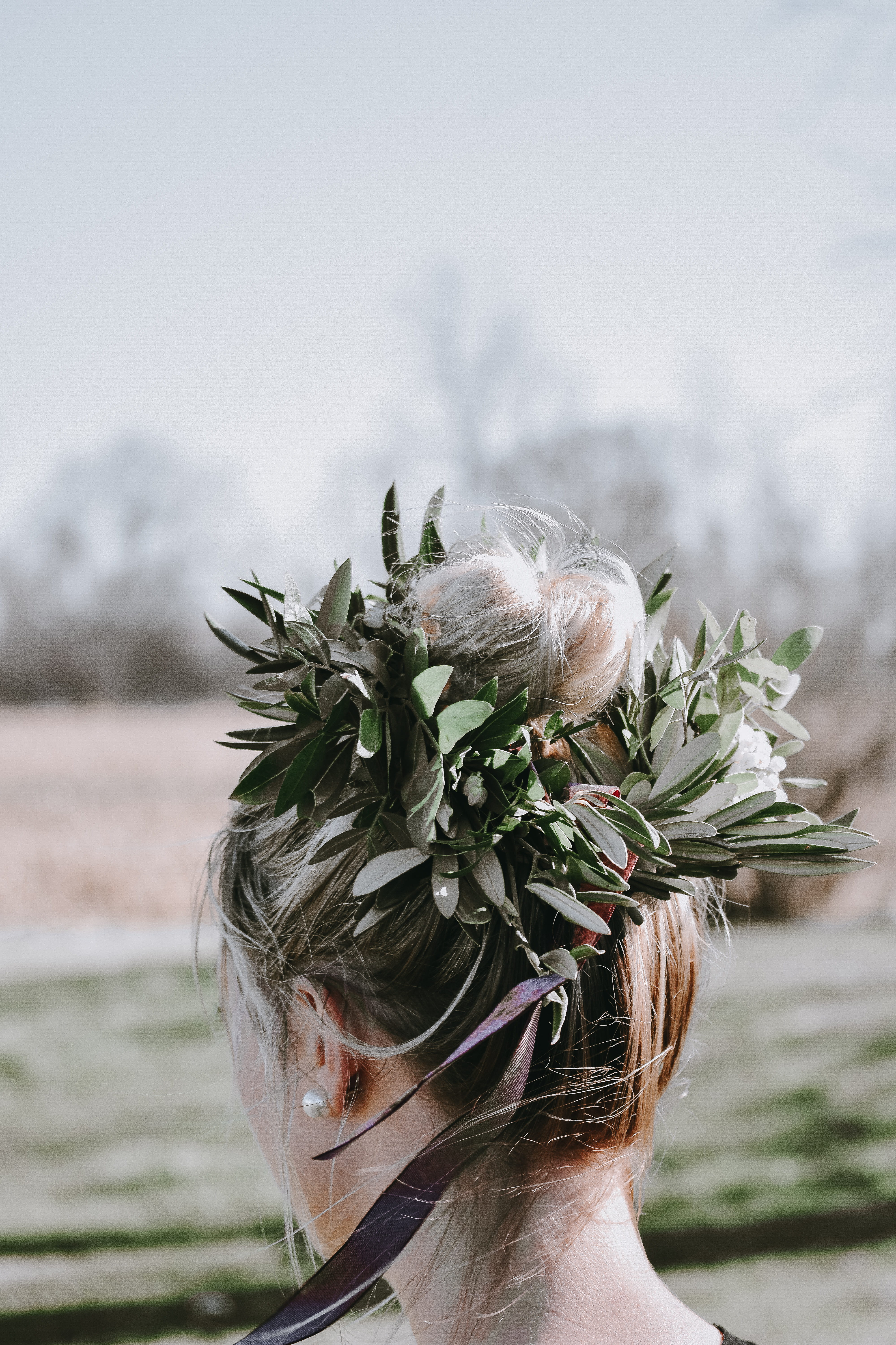 person, headshot, flowering plant, girl, pose, adult, day, outdoors, hair, woman, nape, flower, sky, flower arrangement, outdoor, green, outside, human hair, Phone HD Wallpaper