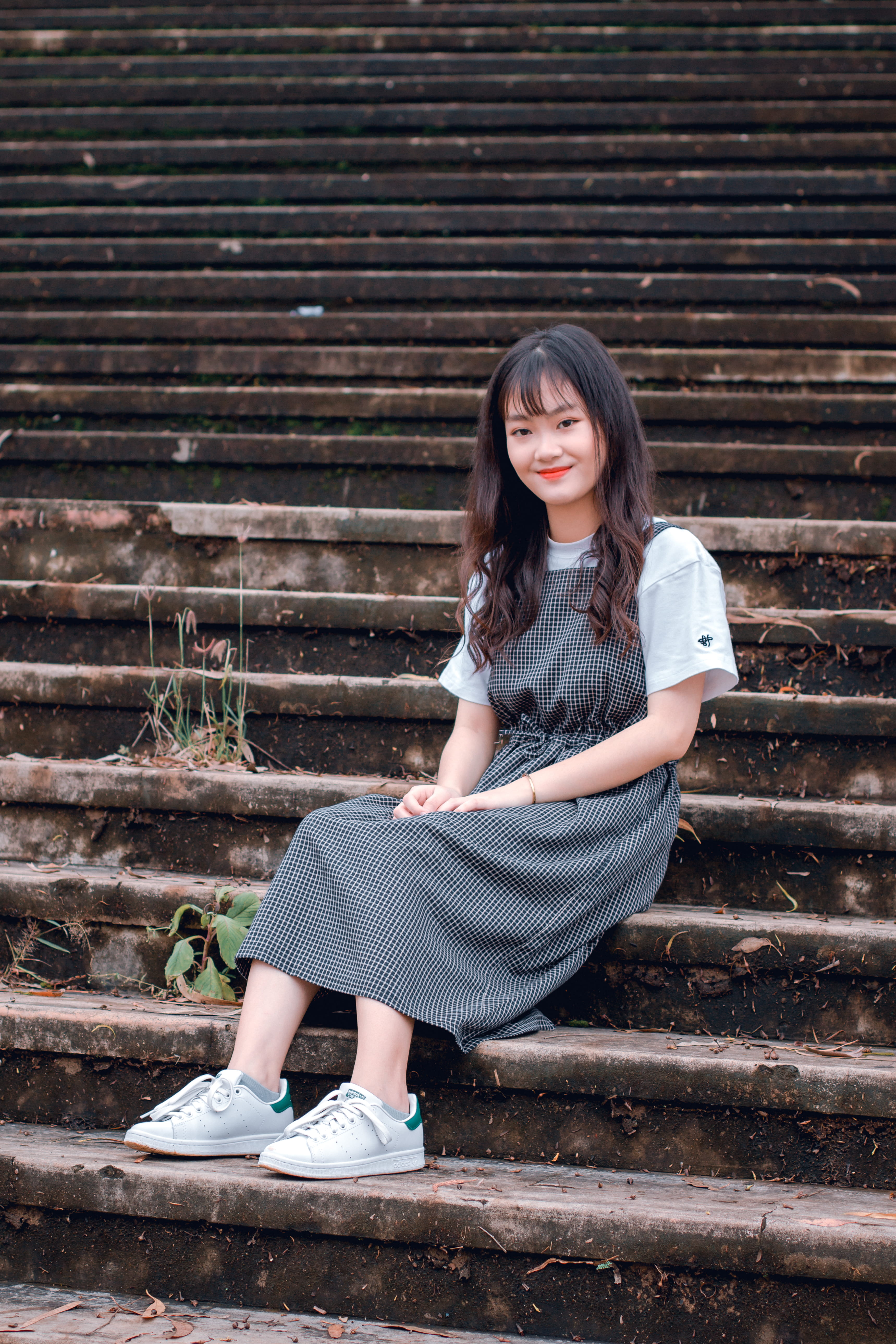 person, dress, hairstyle, daytime, smile, beauty, fashion, concrete, stairway, girl, hair, young women, sitting, portrait, beautiful woman, gray, public domain images, Phone HD Wallpaper