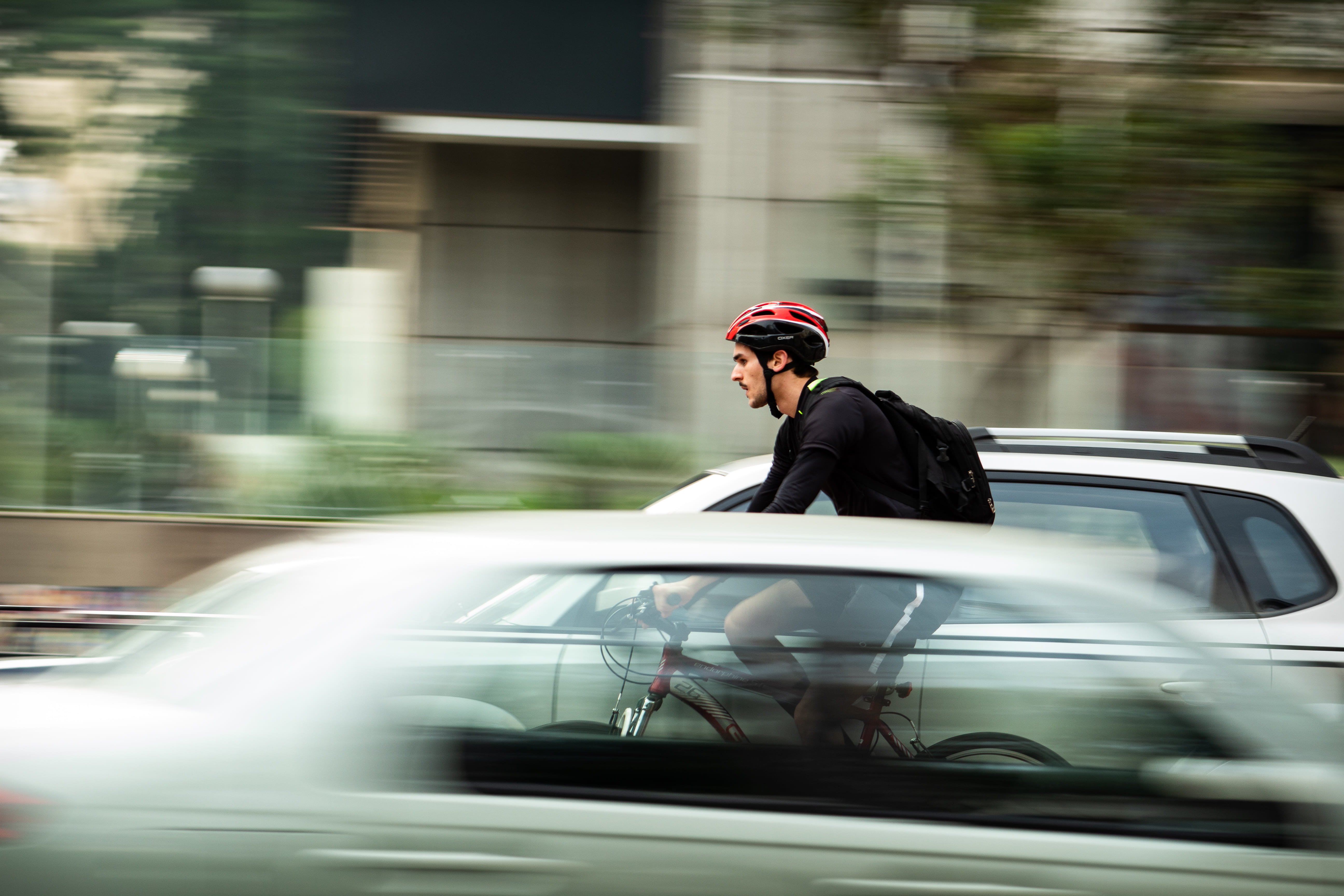 road, blurred motion, speed, transportation, selective focus, cycling, male, real people, land vehicle, vehicle, 5K, panning, day, near, cyclist, movement, HD Wallpaper