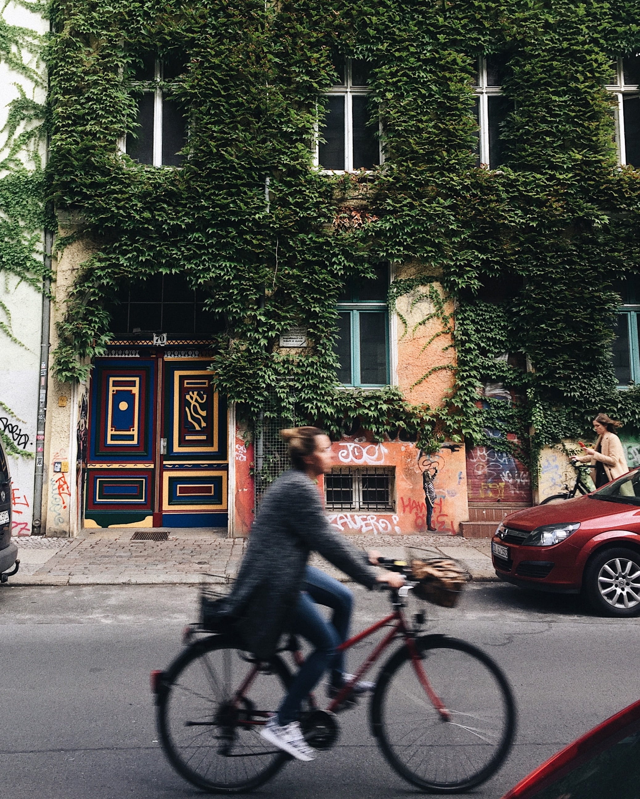 traffic, daylight, riding, cyclist, house, bike, tree, road, built structure, car, beside, city, concrete, real people, full length, wheel, transportation, Phone HD Wallpaper