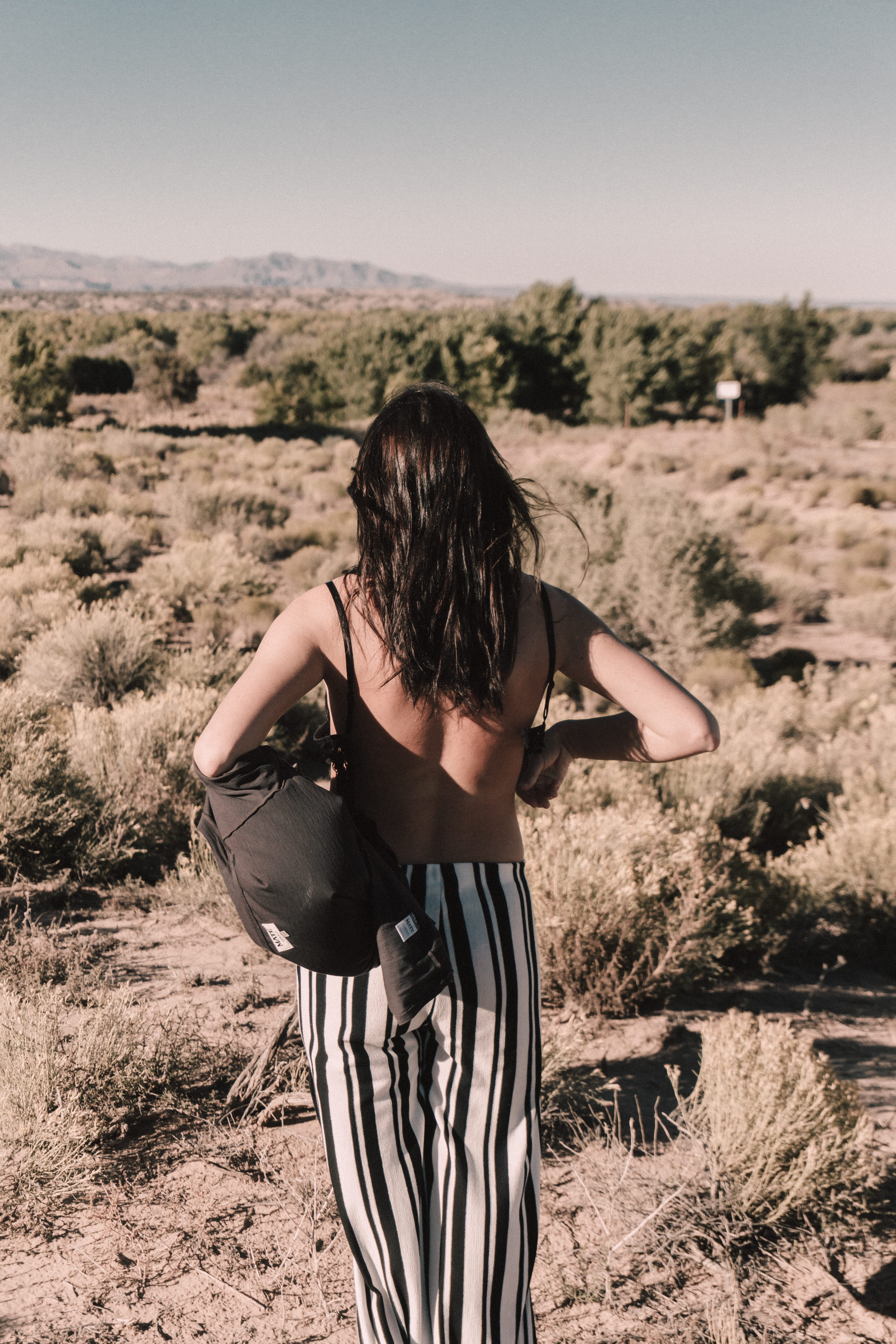 colors, united states, day, hand, girl, desert, portrait, women, standing, leisure activity, dawn, 5K, vibrant, land, three quarter length, vans, nature, Phone HD Wallpaper
