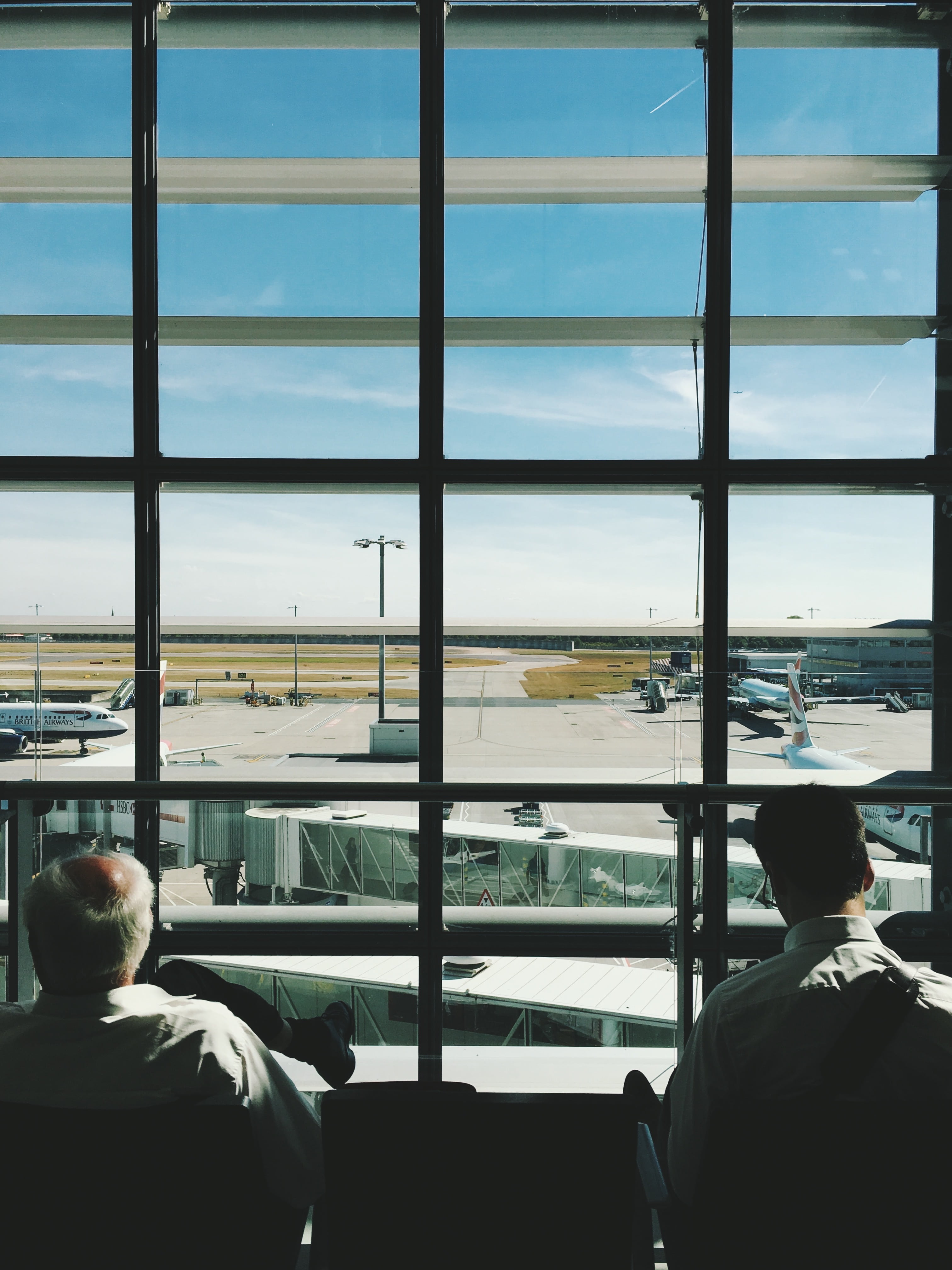 real people, air vehicle, outdoors, glass, window, transportation, travel, mode of transportation, looking through window, airport runway, men, looking, Phone HD Wallpaper