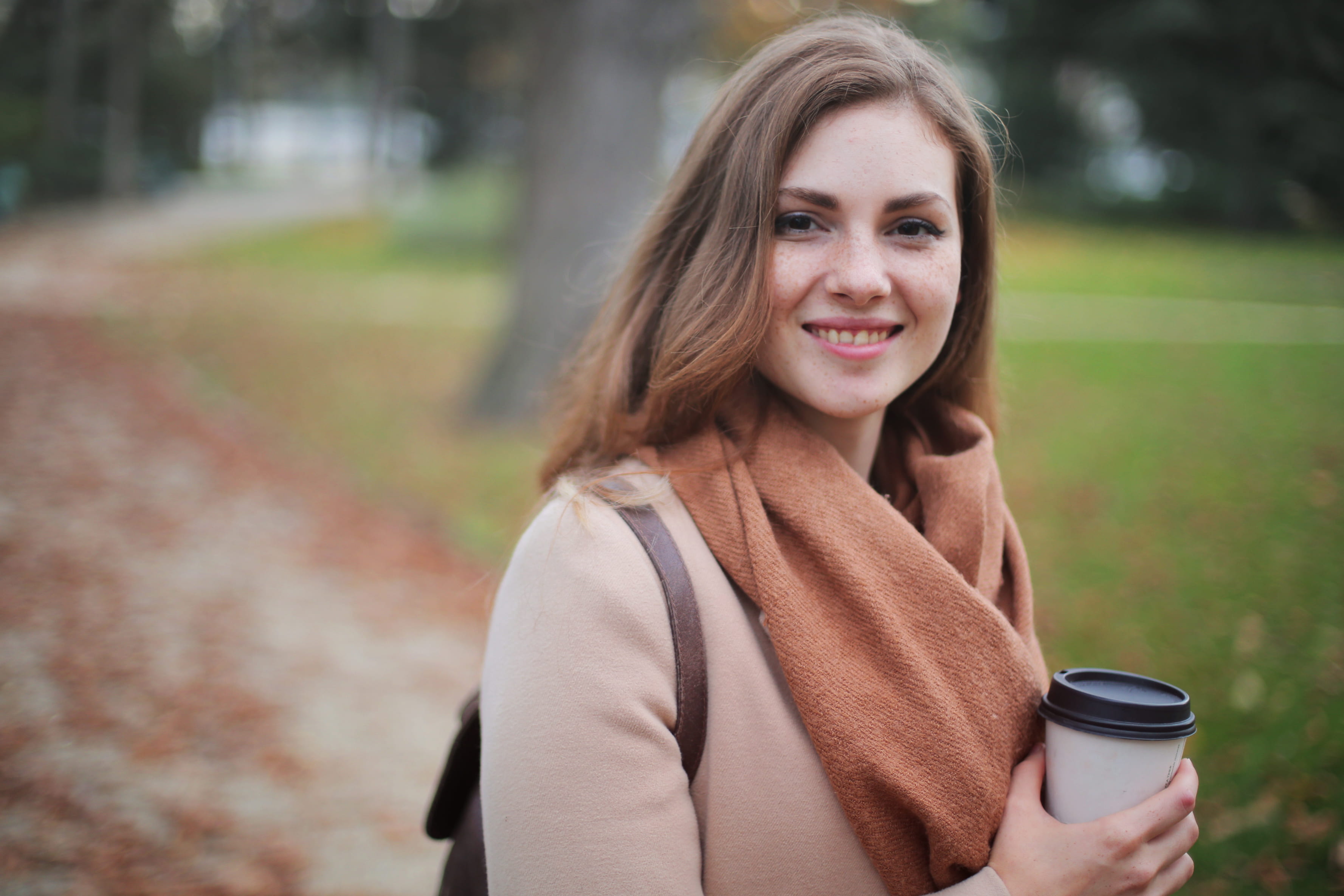 enjoyment, person, photoshoot, drink, relaxation, caucasian, blur, one person, daylight, woman, 2K, path, park, hair, adolescent, smiling, happiness, blond hair, HD Wallpaper
