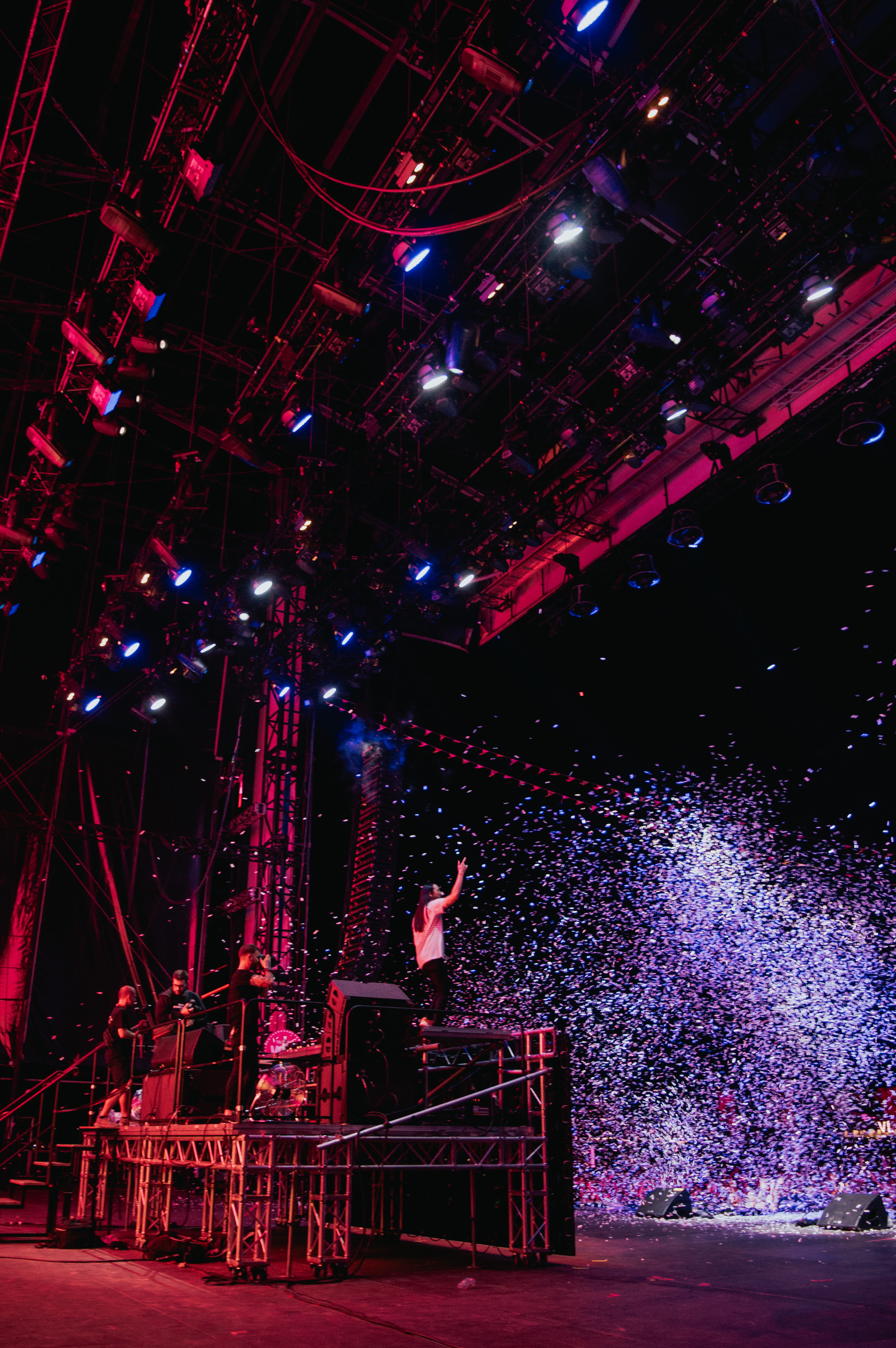 illuminated, 5K, light, popular music concert, hungary, architecture, sopron, concert, performance, one person, red, steve aoki, full length, lighting equipment, Phone HD Wallpaper