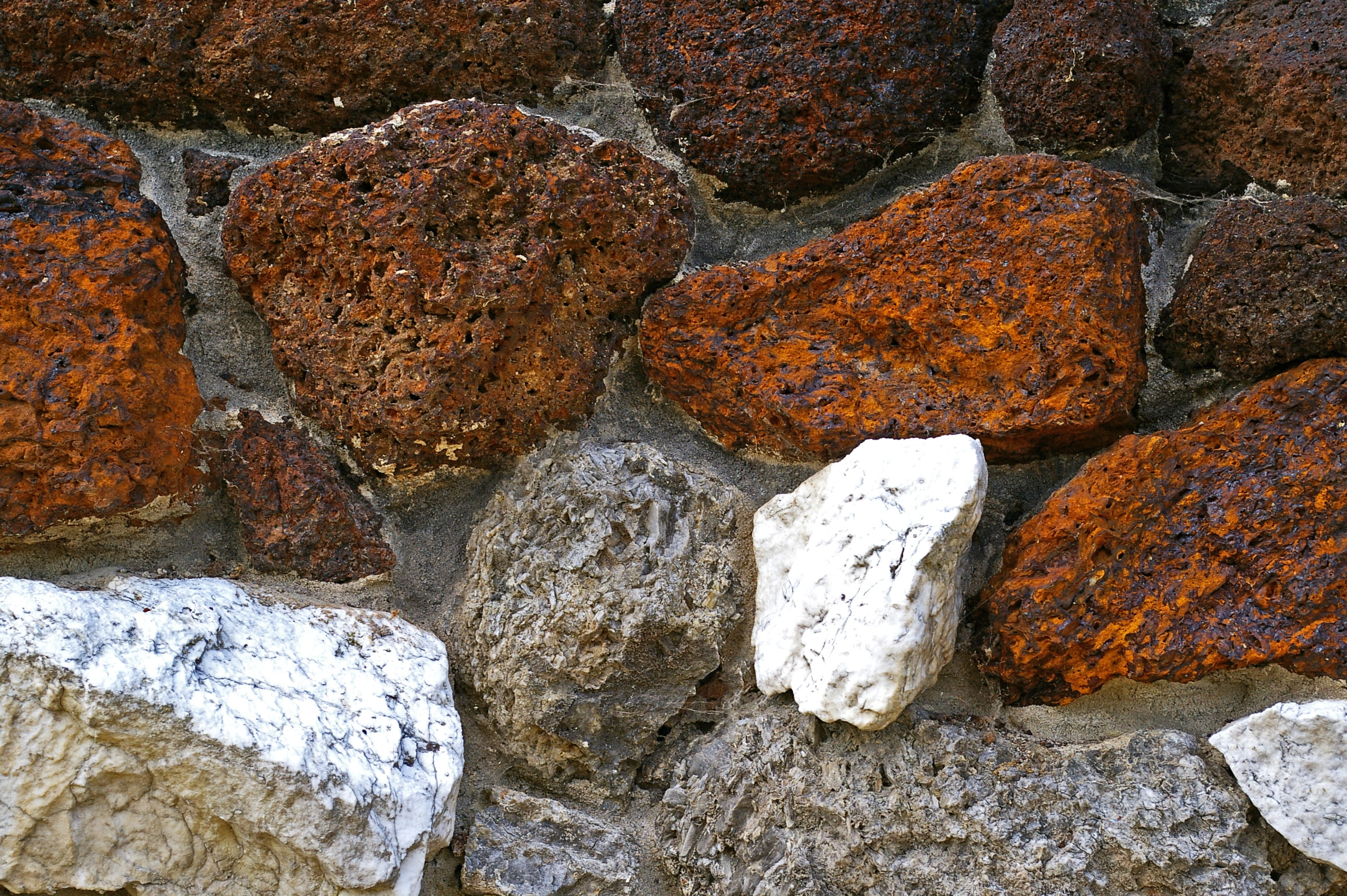 bricked, 2K, water, masonry, eroded, nature, lichen, natural stone wall, structure, stone, rock formation, high angle view, background, surface, rock - object, HD Wallpaper