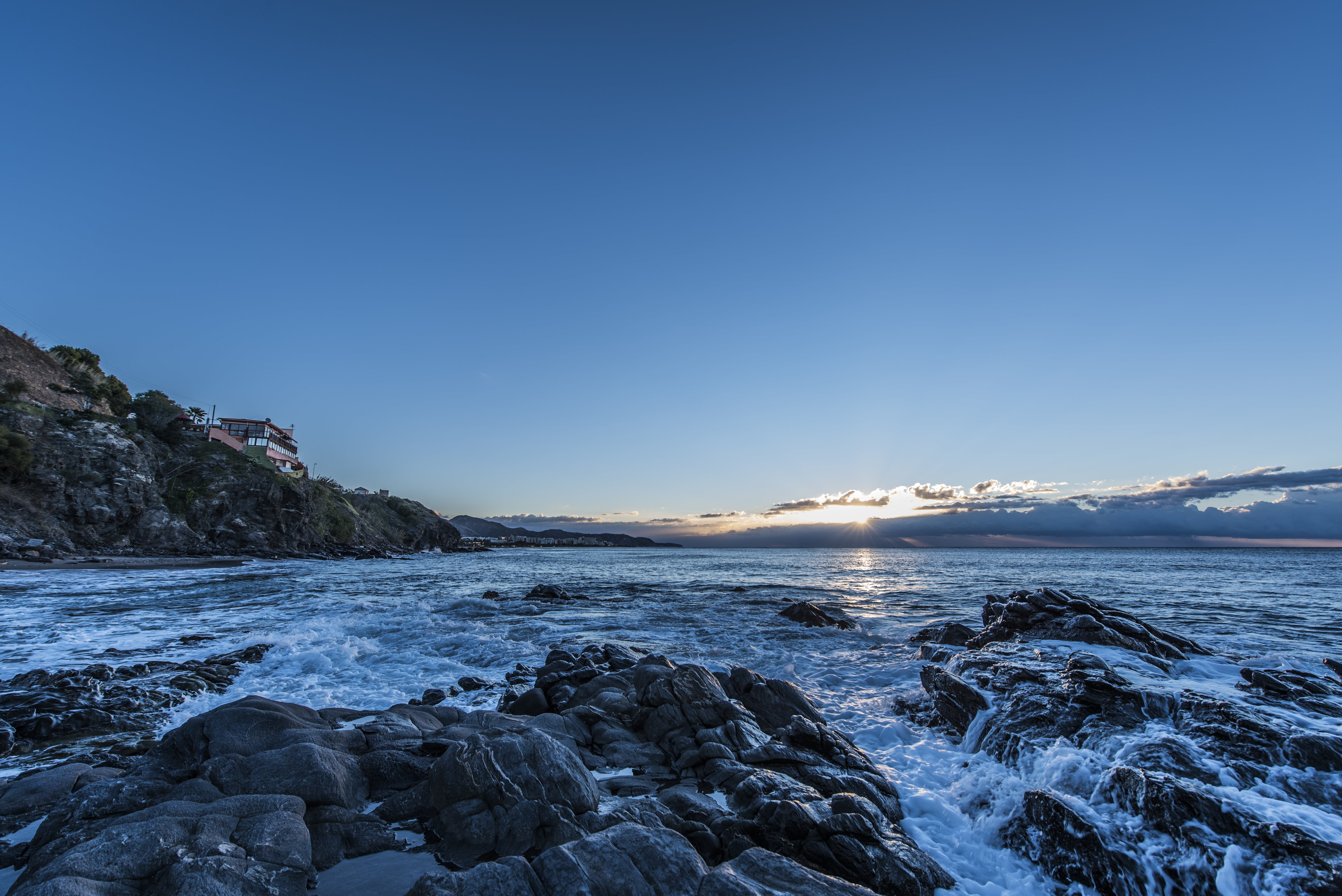 rocks, sea, costa del sol, water, beach, guilche, holiday, sky, 5K, no people, beauty in nature, clear sky, land, nature, landscape, snow, dawn, travel, HD Wallpaper