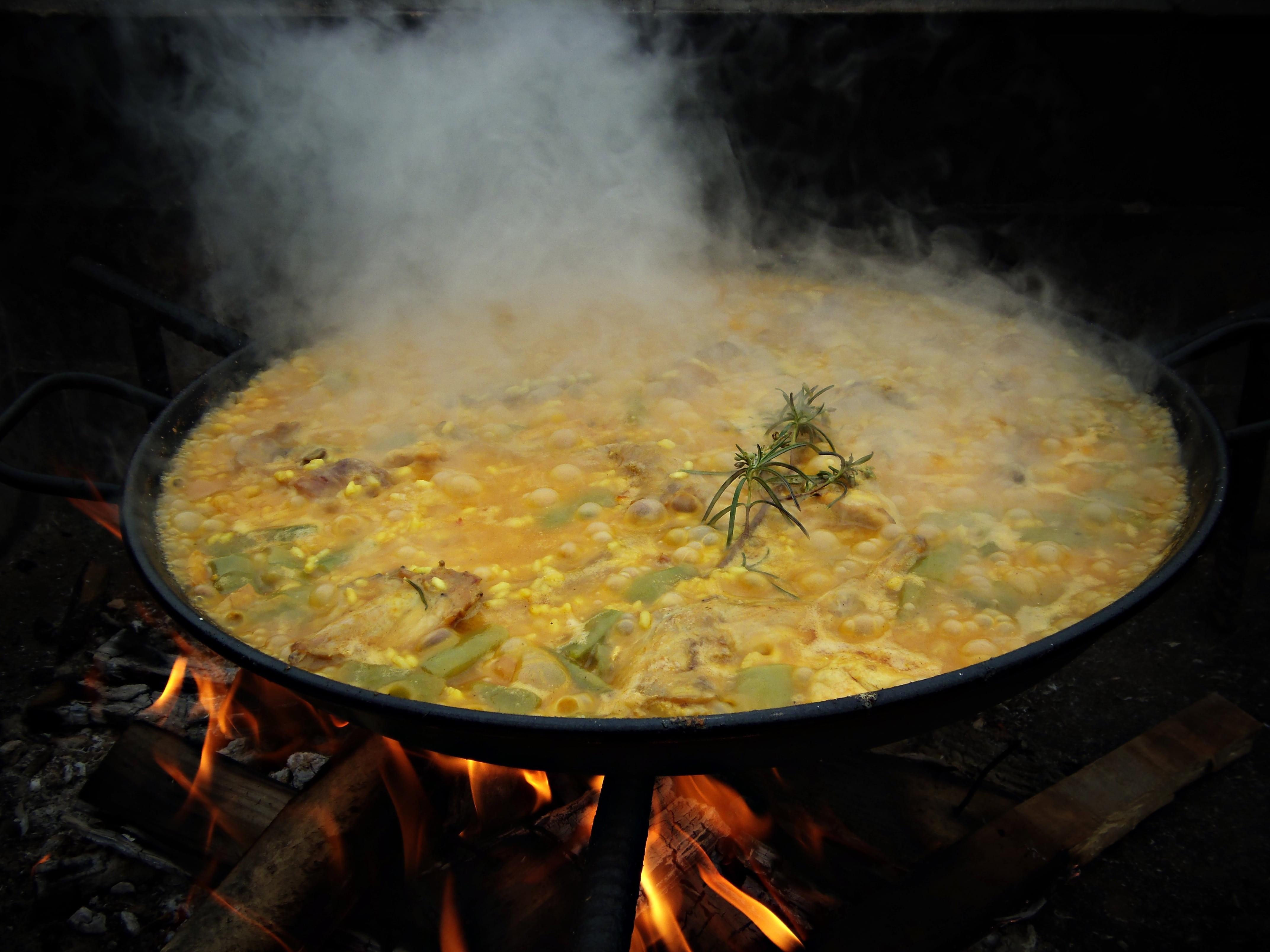 firewood burned, high angle view, flame, paella, preparation, heat - temperature, nutrition, party, spain, rice, delicious, cooking pan, fire - natural phenomenon, HD Wallpaper