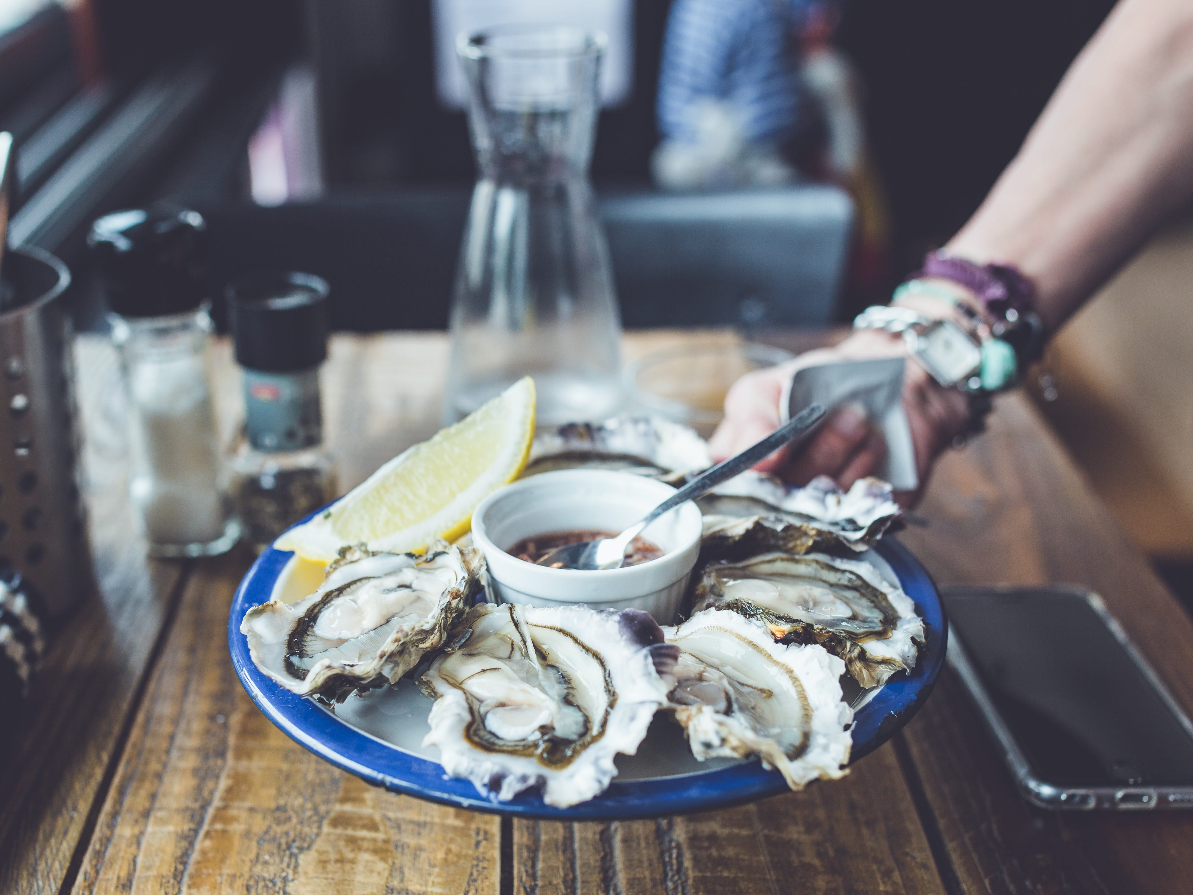 citrus, human hand, citrus fruit, food, dish, food and drink, table, shellfish, restaurant, sea, focus on foreground, oysters, tray, freshness, ready-to-eat, HD Wallpaper