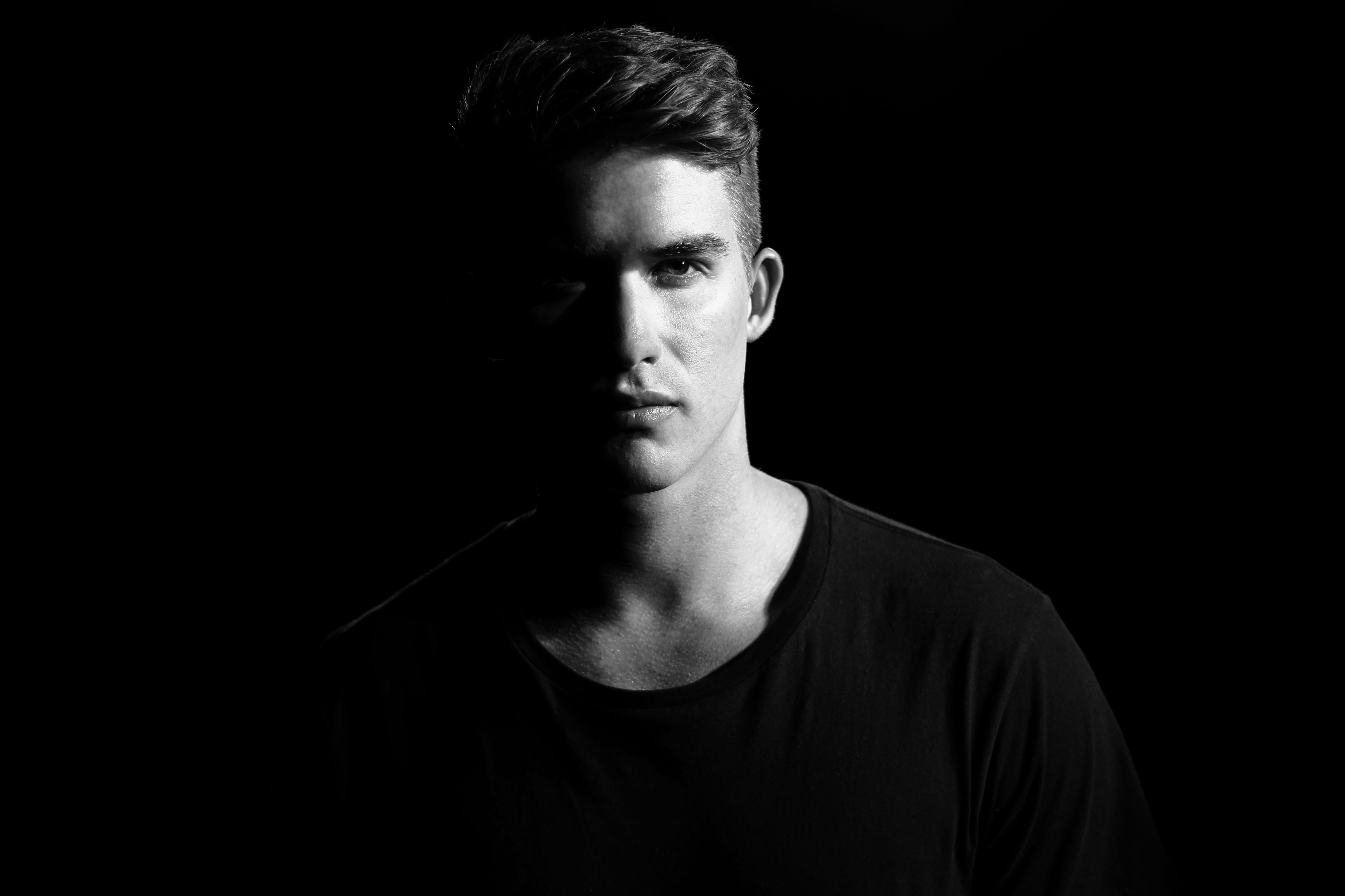 camera, headshot, serious, casual clothing, looking at camera, front view, half, man, contemplation, black background, face, portrait, submerged, copy space, HD Wallpaper