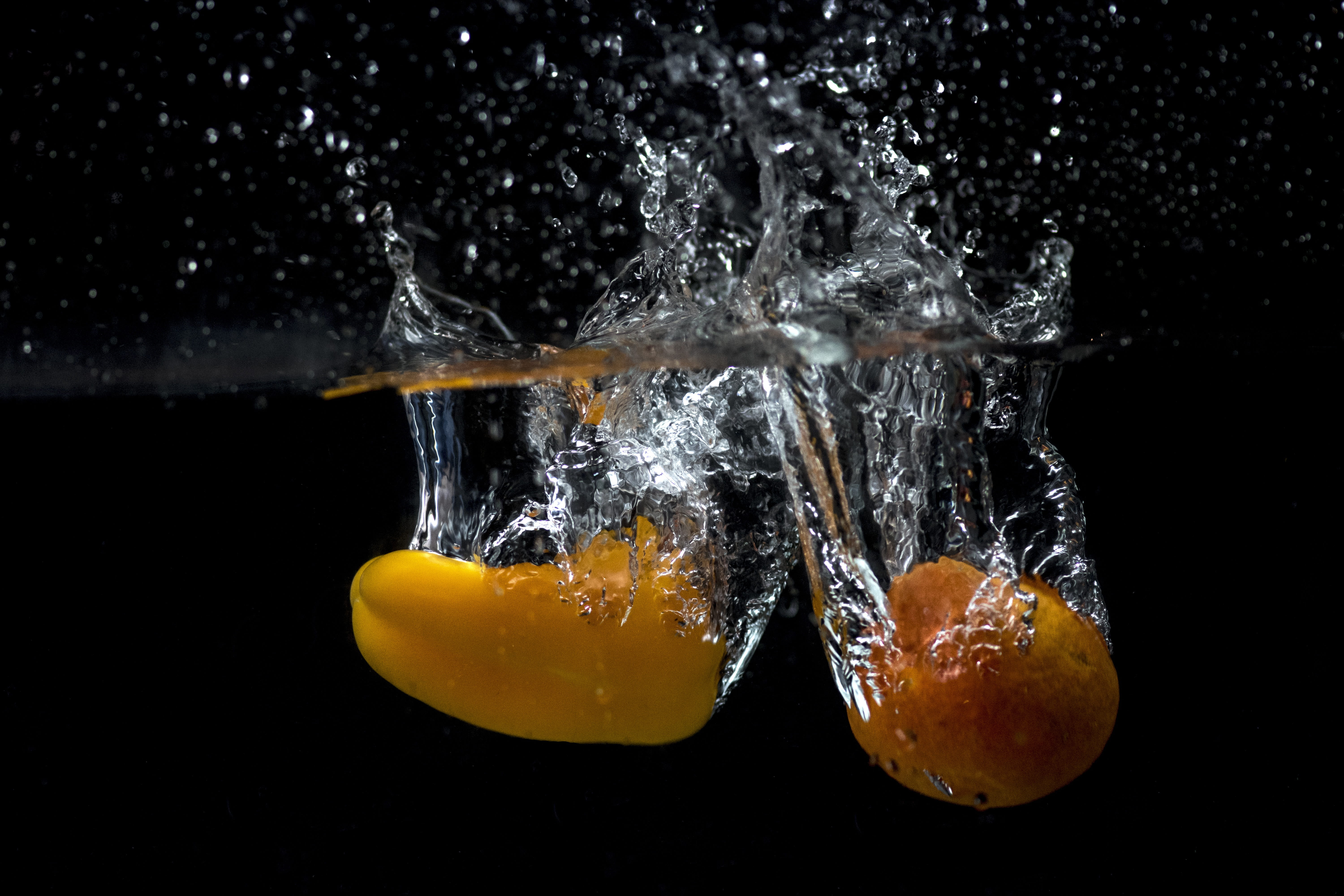 splashing, freshness, high-speed photography, impact, close-up, motion, black background, drop, indoors, peppers, orange, water, yellow, purity, orange color, HD Wallpaper