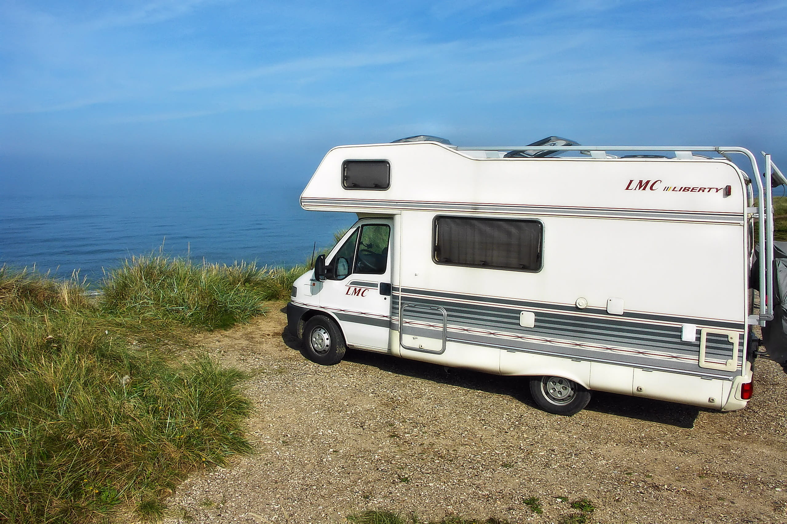 grass, motor home, view, travel, day, water, enjoy, no people, cliffs, land vehicle, sky, relax, dom, beach, blue, plant, camping, motor vehicle, cloud - sky, HD Wallpaper