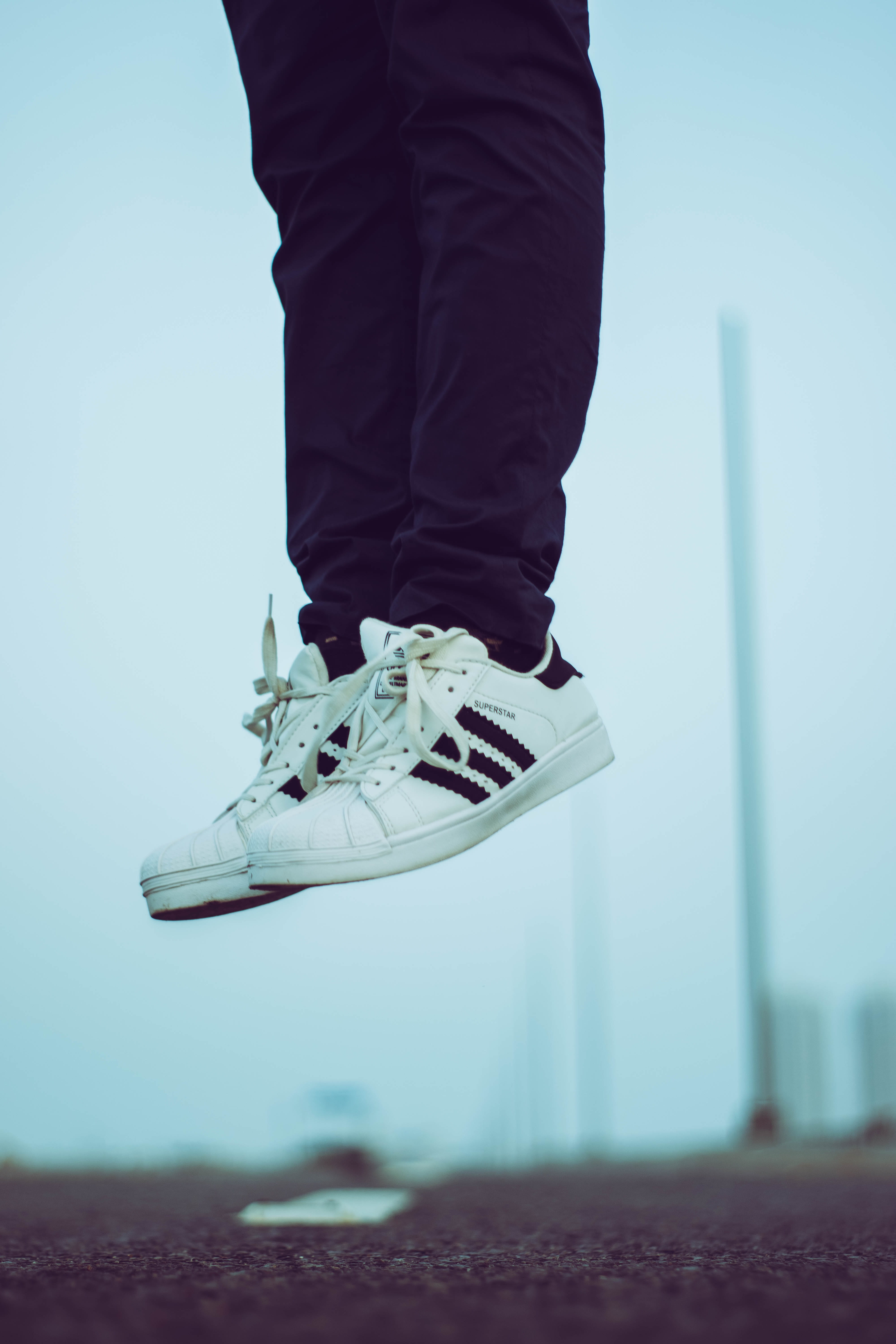street, human leg, body part, jump, human body part, unrecognizable person, adidas, real people, man, day, mid-air, nature, human foot, leisure activity, Phone HD Wallpaper