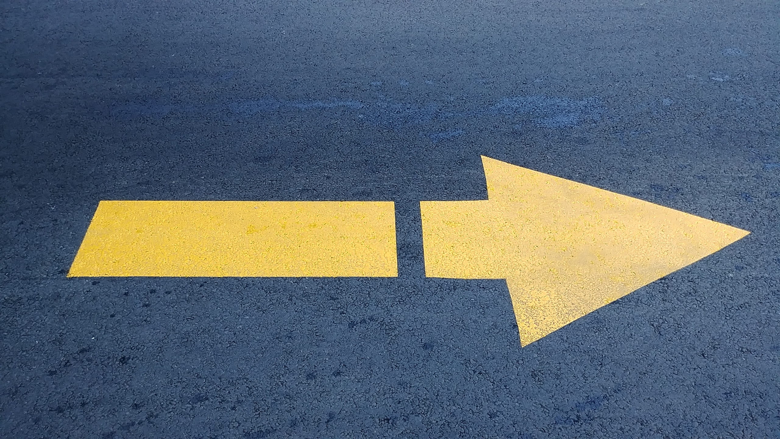 day, asphalt, arrow symbol, directional sign, yellow, marking, street, arrow, high angle view, textured, road sign, communication, guidance, 2K, dividing line, HD Wallpaper